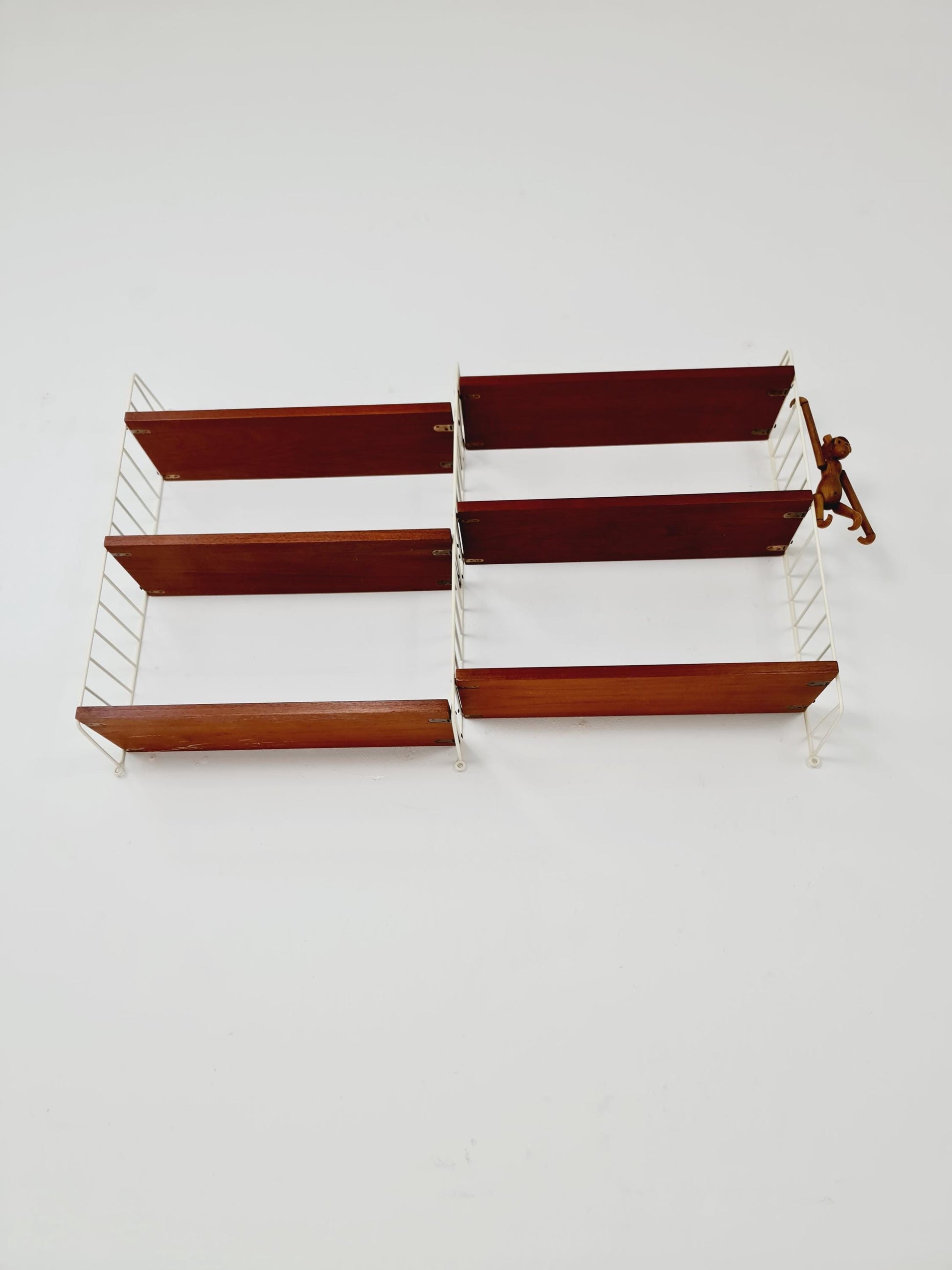 Original MCM Teak shelving system - consists of white lacquered metal ladders, from string Stockholm 1960s