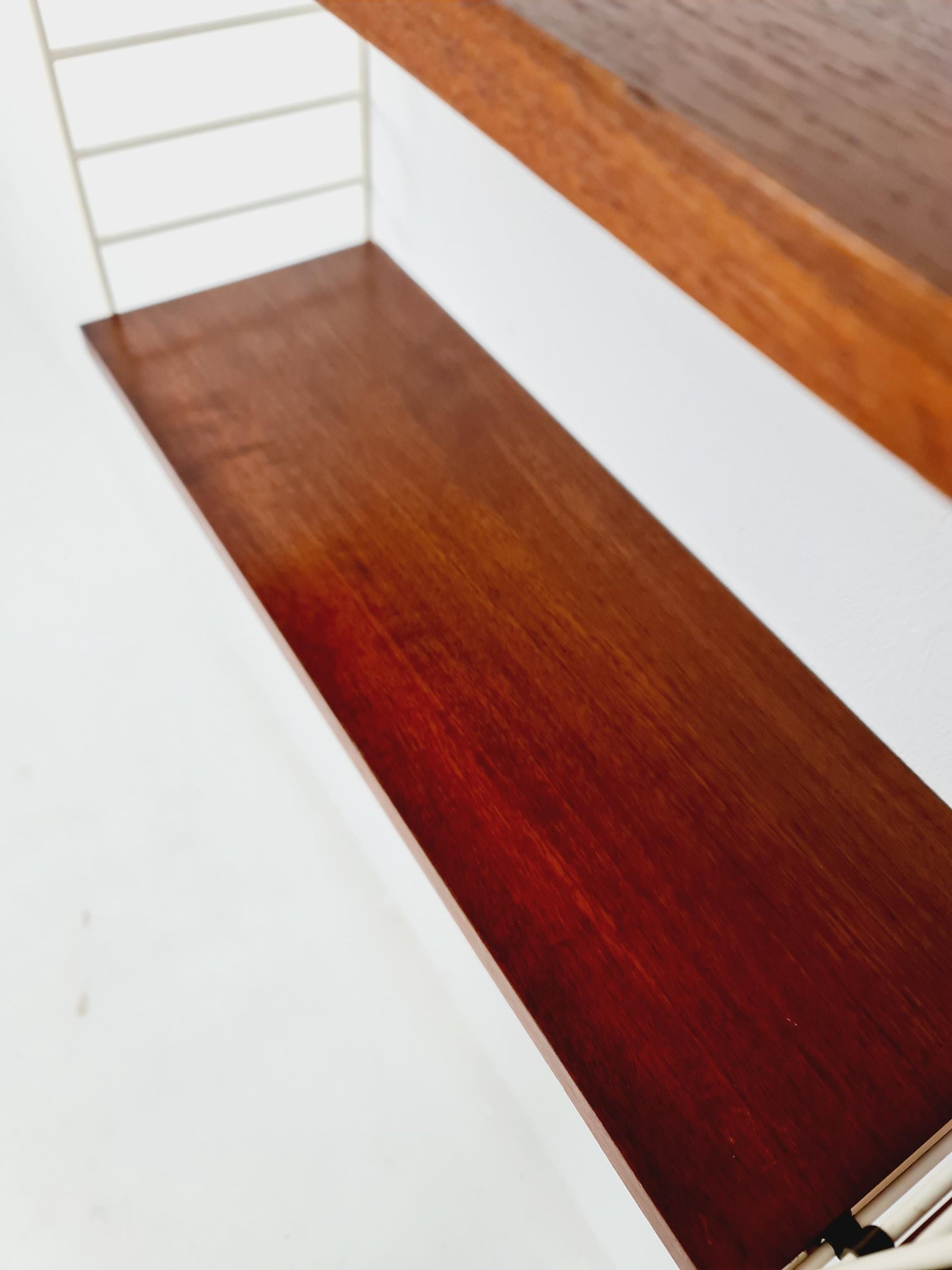 Original MCM Teak shelving system - consists of white lacquered metal ladders, from string Stockholm 1960s