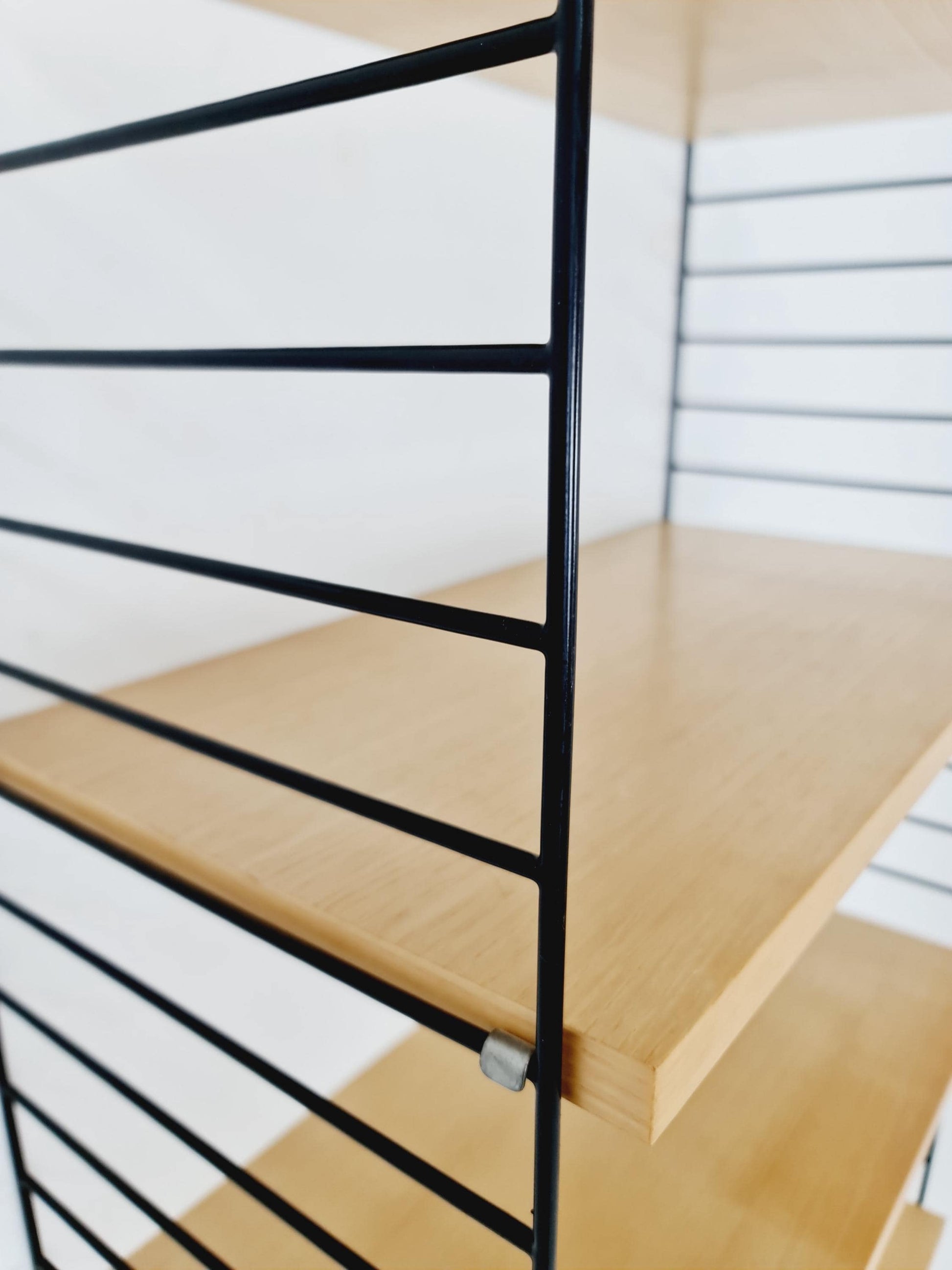 Original MCM Ash shelving system - consists of Black lacquered metal ladders, from string Stockholm 1960s