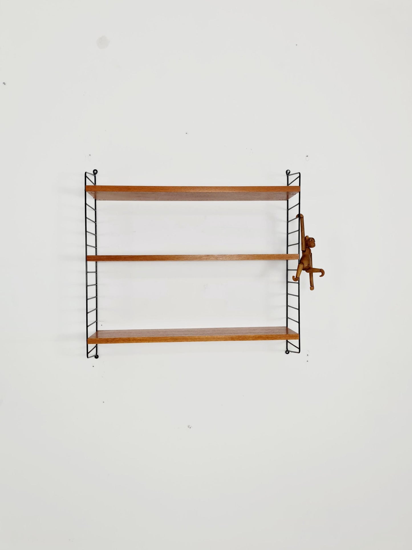 Original MCM Teak shelving system - consists of black lacquered metal ladders, from string Stockholm 1960s
