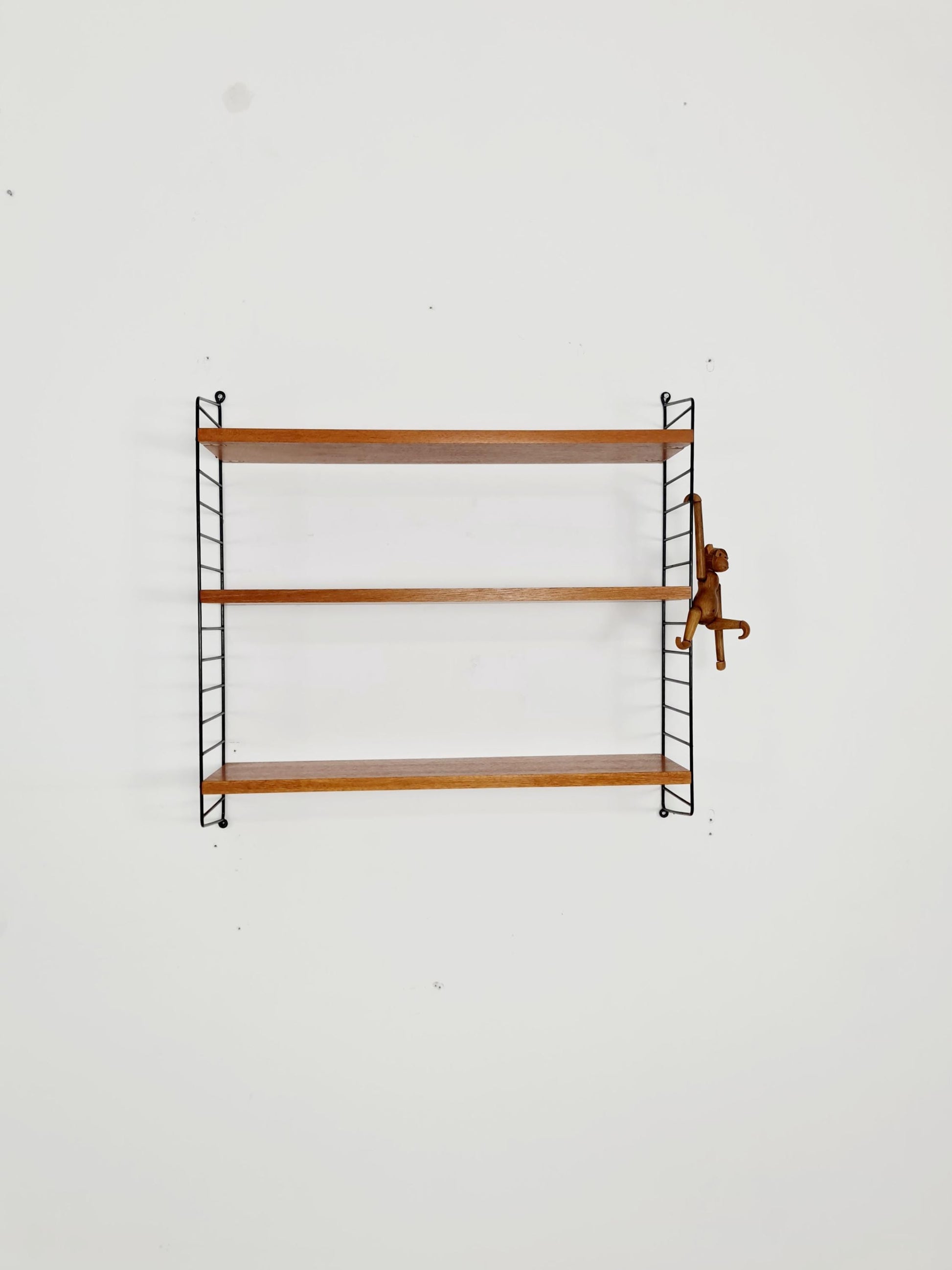 Original MCM Teak shelving system - consists of black lacquered metal ladders, from string Stockholm 1960s