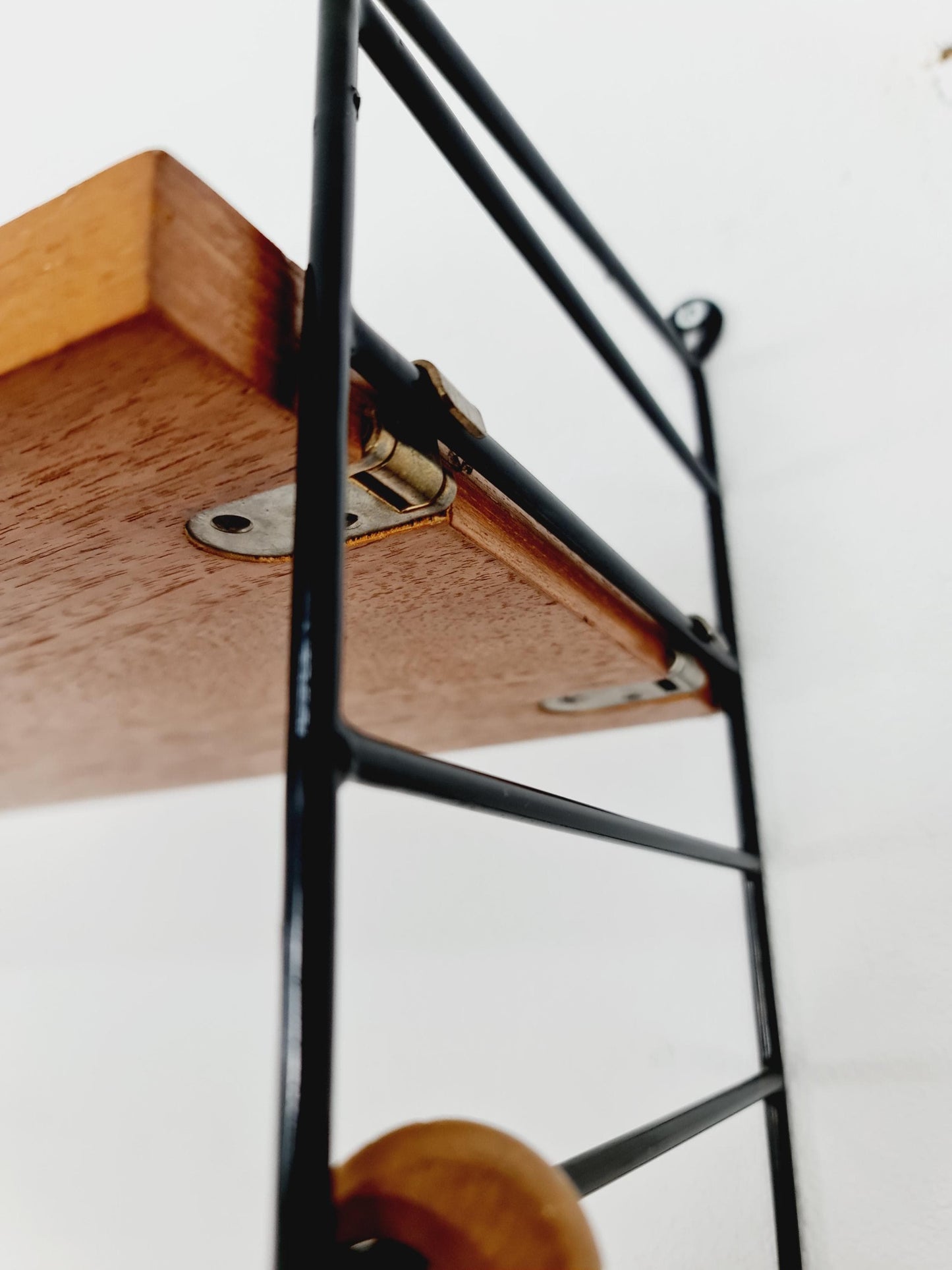 Original MCM Teak shelving system - consists of black lacquered metal ladders, from string Stockholm 1960s