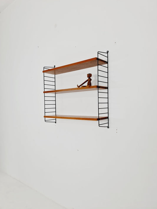 Original MCM Teak shelving system - consists of black lacquered metal ladders, from string Stockholm 1960s