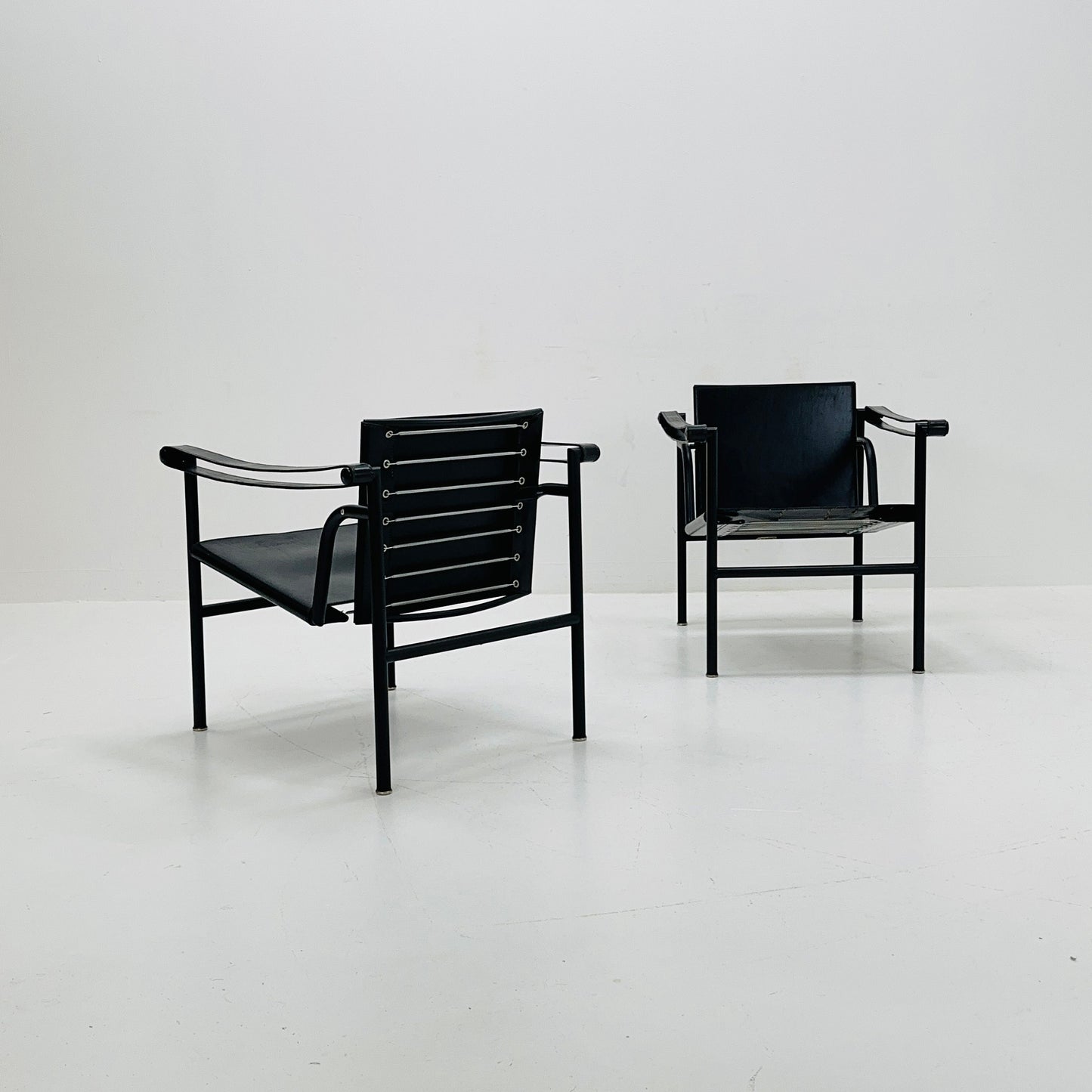 1 of 2 Lc 1 Mid century black edition armchair by Le Corbusier for Cassina Italy 1970s