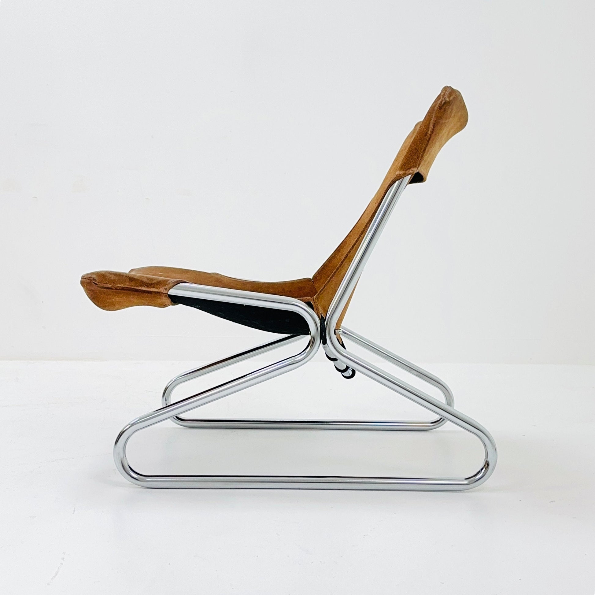 Mid century easy Sling Lounge Chair in alcantara Nubuck cognac leather by Lusch & Co West Germany 1980s