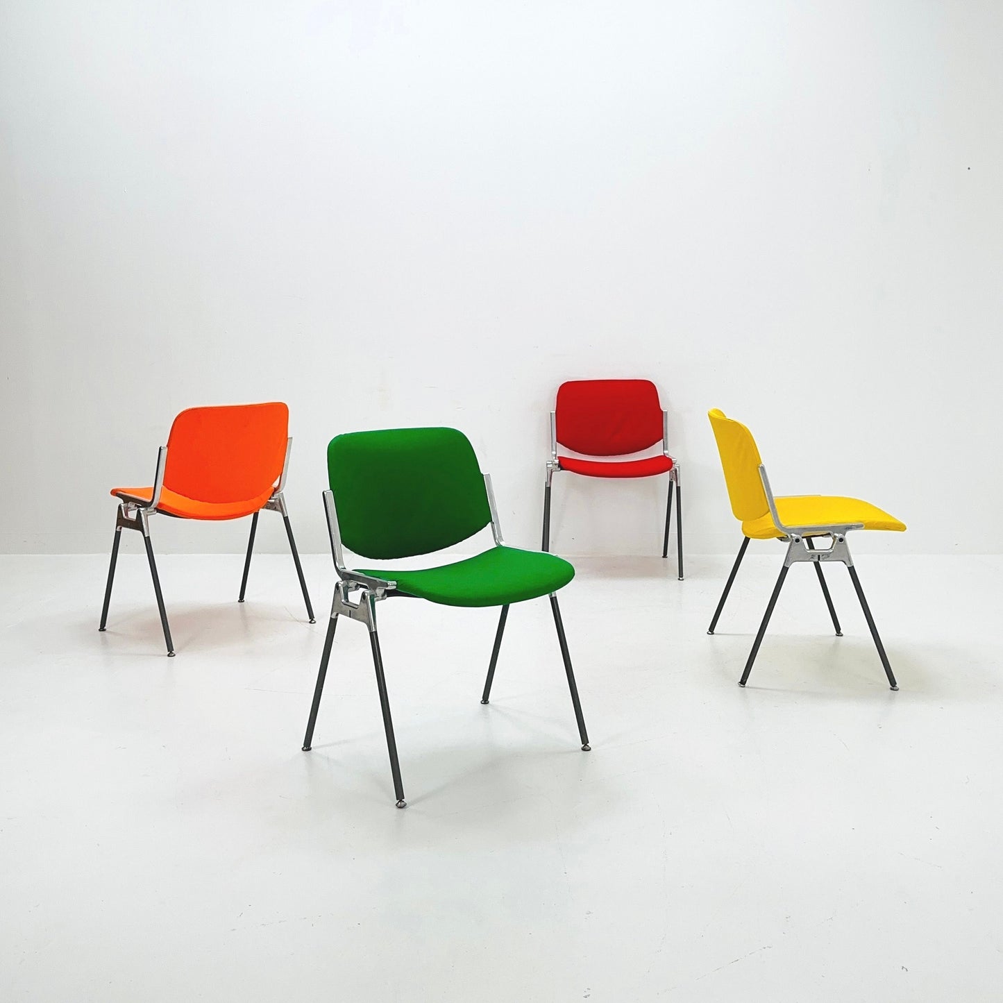 Set of 4 Colors Mid century Stackable chairs by Giancarlo Piretti for Anomima Castelli ,Italy 1960s