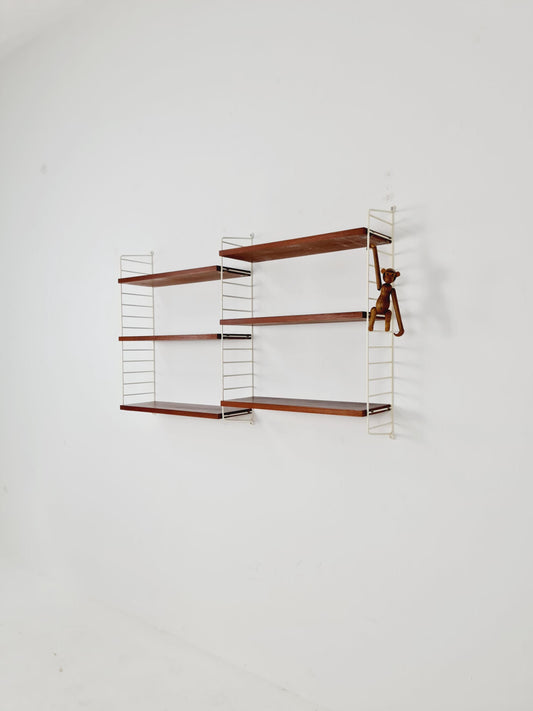 Original MCM Teak shelving system - consists of white lacquered metal ladders, from string Stockholm 1960s
