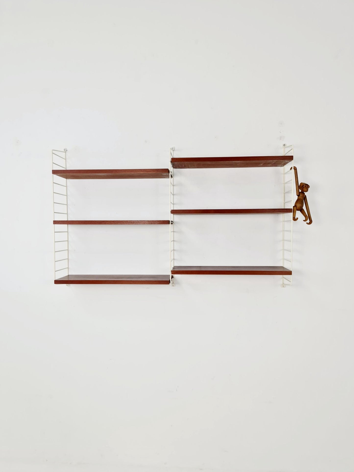 Original MCM Teak shelving system - consists of white lacquered metal ladders, from string Stockholm 1960s
