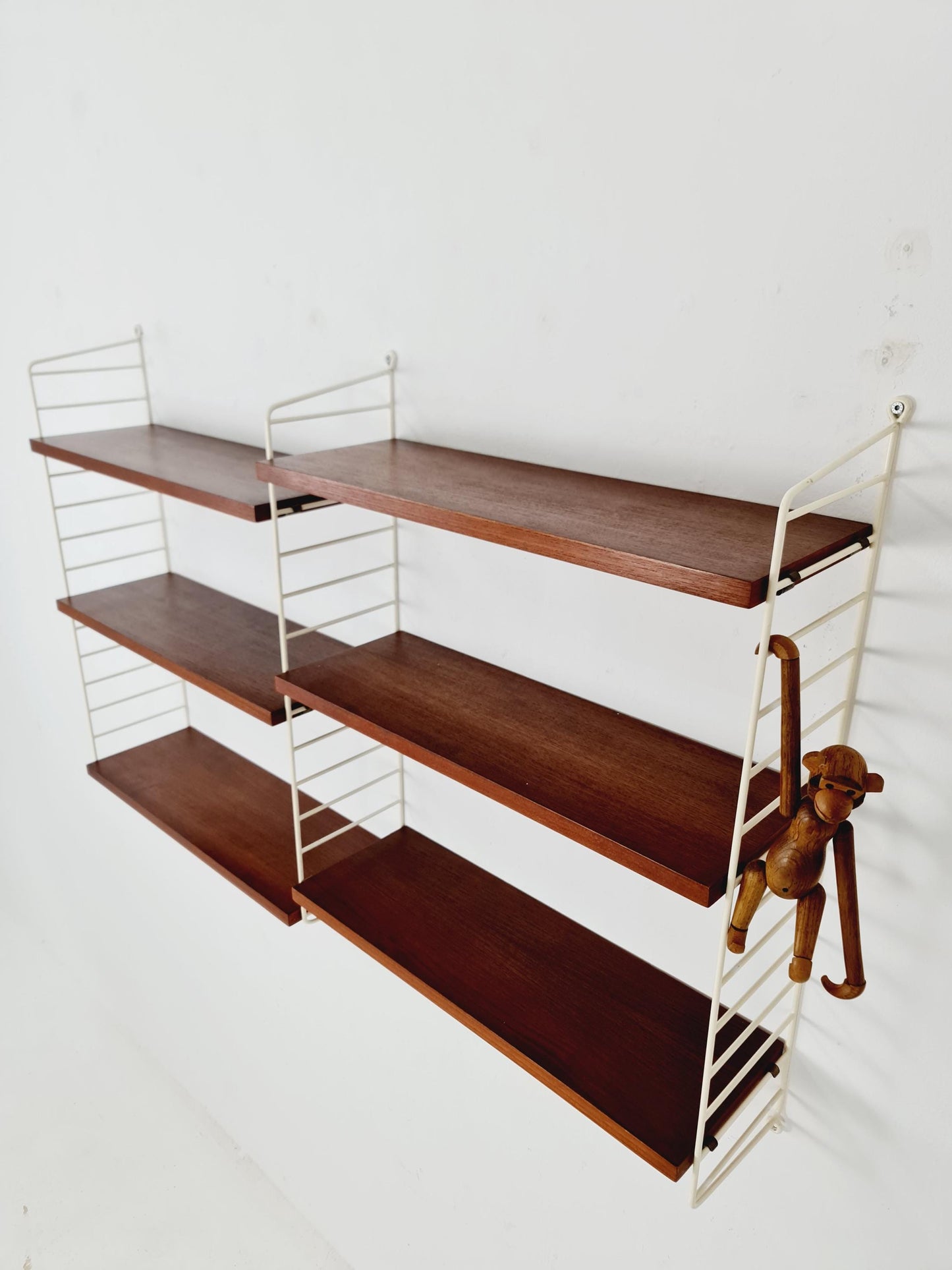 Original MCM Teak shelving system - consists of white lacquered metal ladders, from string Stockholm 1960s