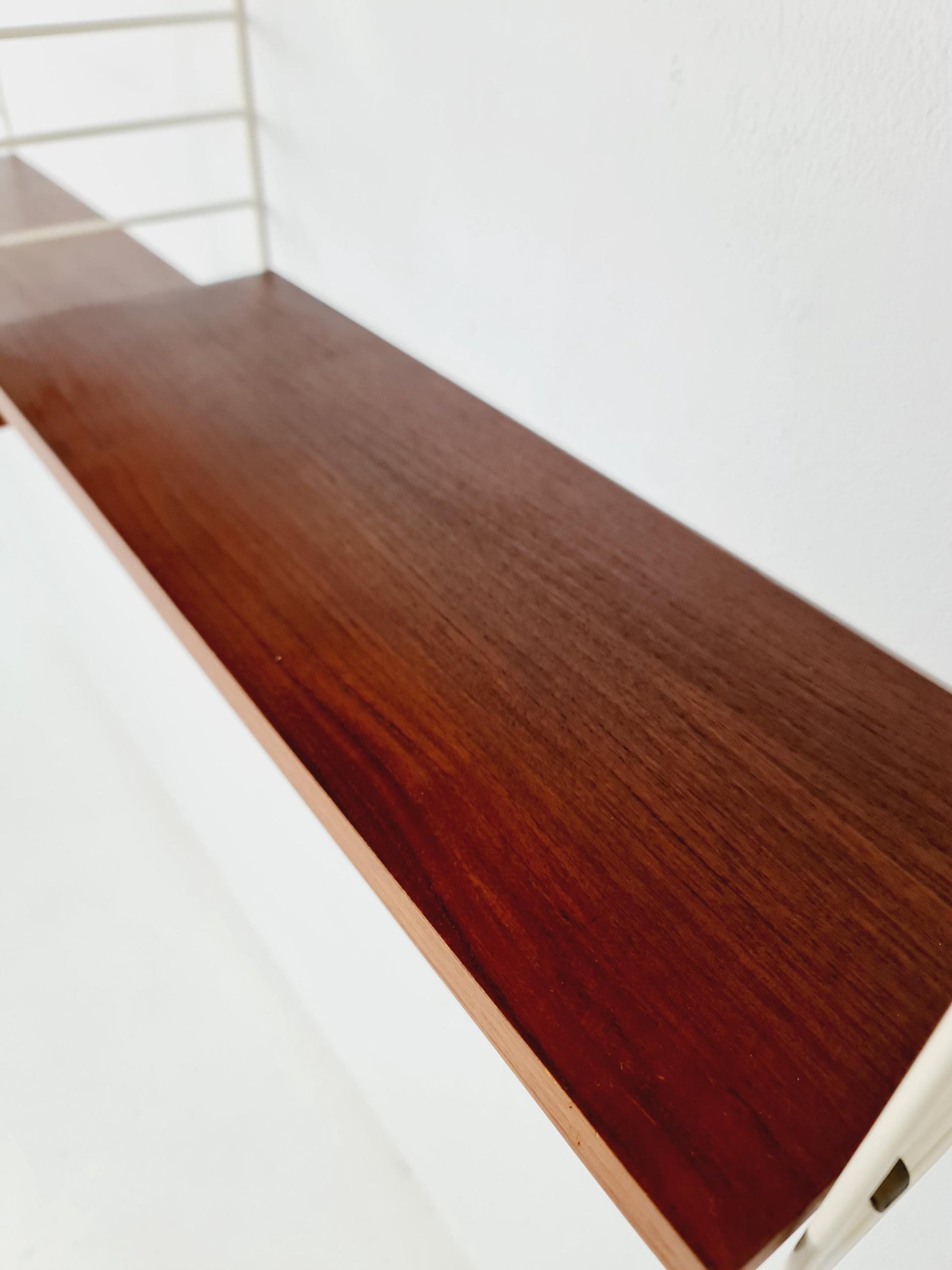 Original MCM Teak shelving system - consists of white lacquered metal ladders, from string Stockholm 1960s