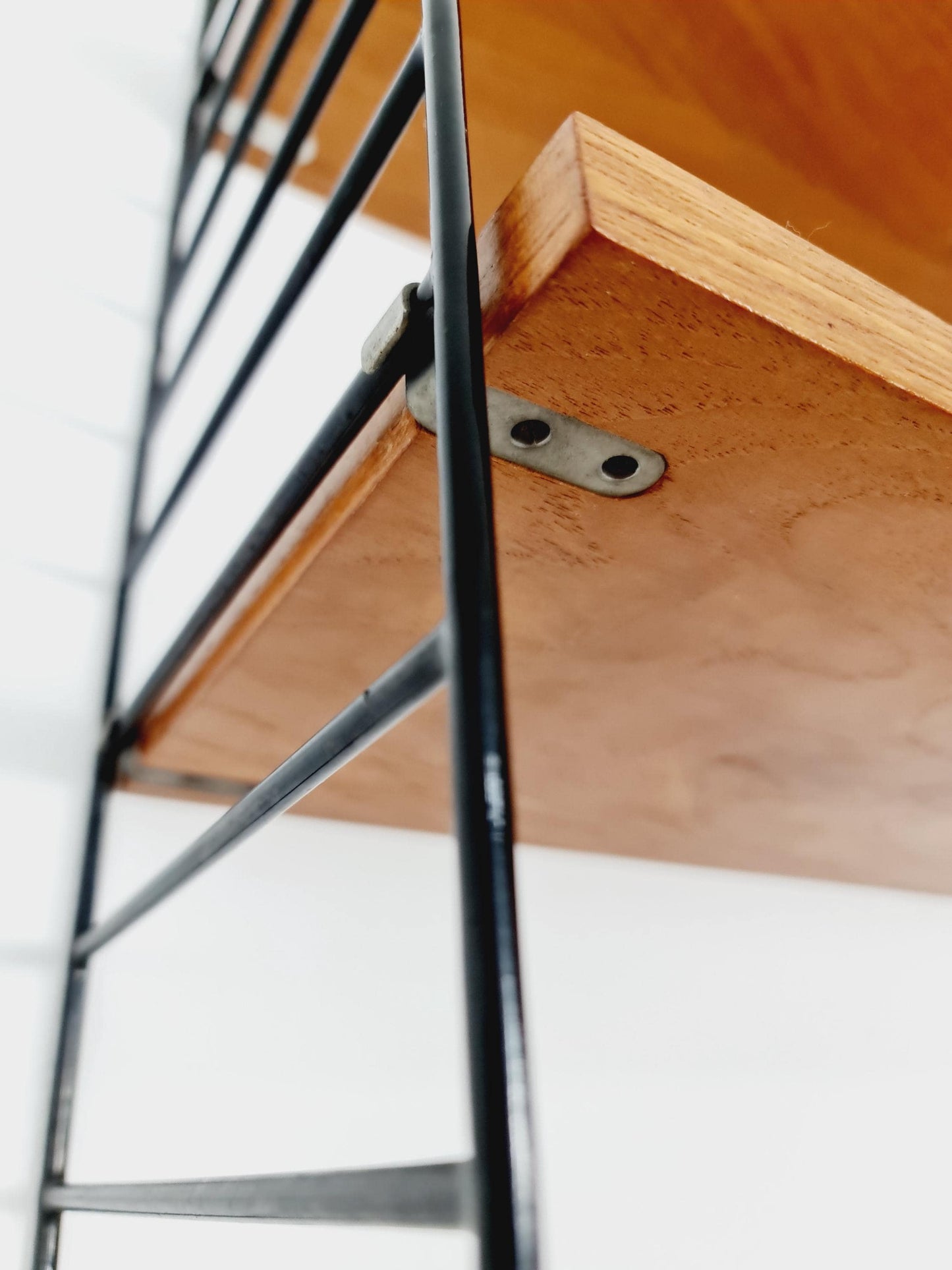 Original MCM Teak shelving system - consists of black lacquered metal ladders, from string Stockholm 1960s