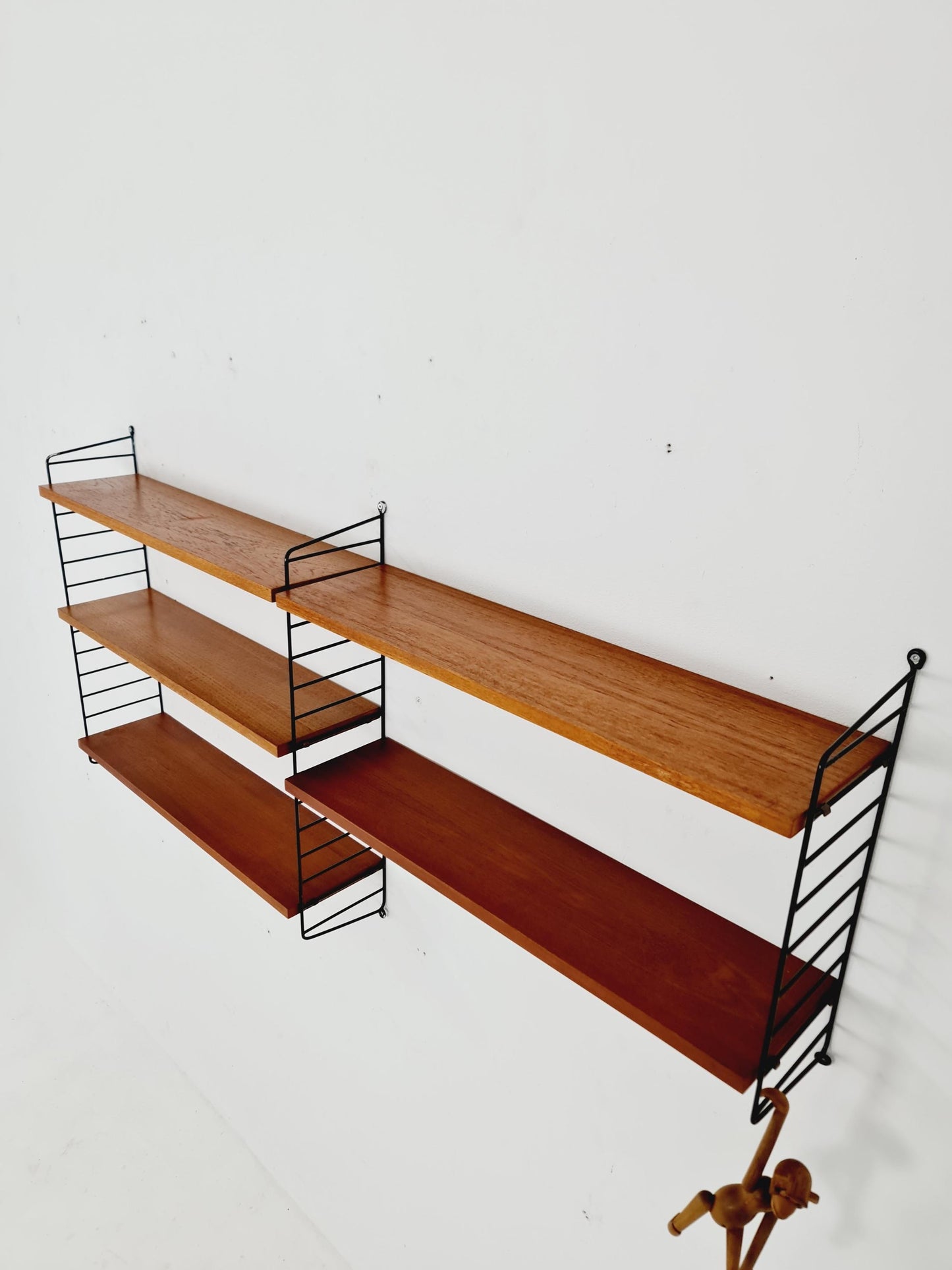 Original MCM Teak shelving system - consists of black lacquered metal ladders, from string Stockholm 1960s
