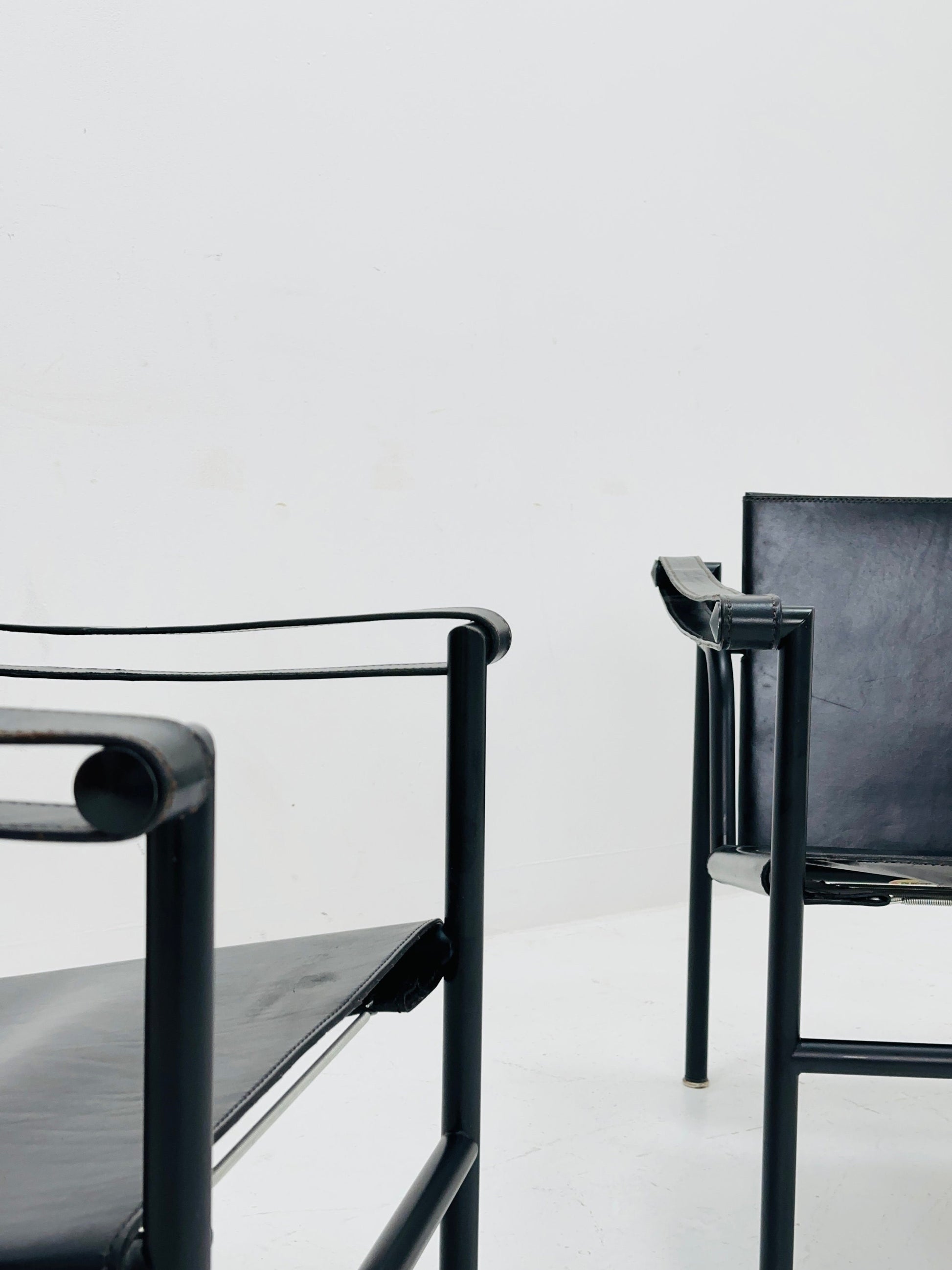 1 of 2 Lc 1 Mid century black edition armchair by Le Corbusier for Cassina Italy 1970s