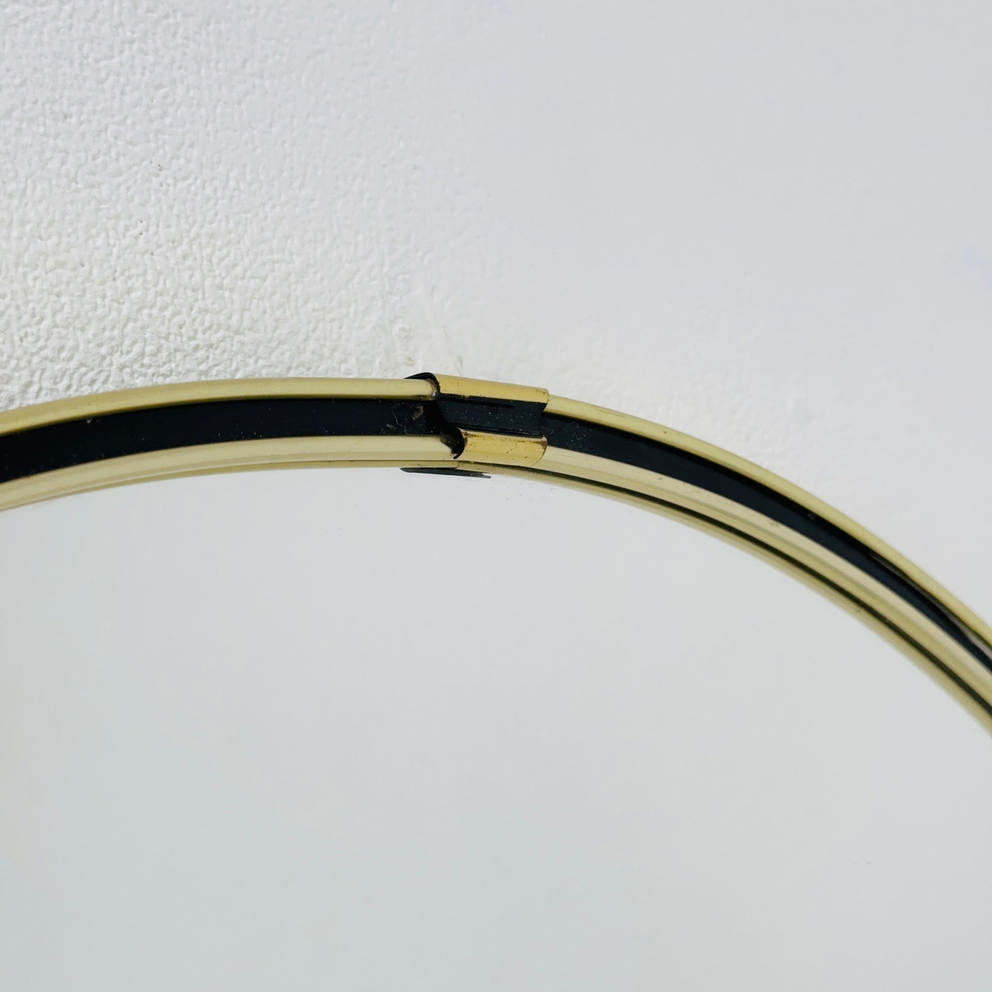 Mid century circle -shaped mirror with golden metal frame- 1960s