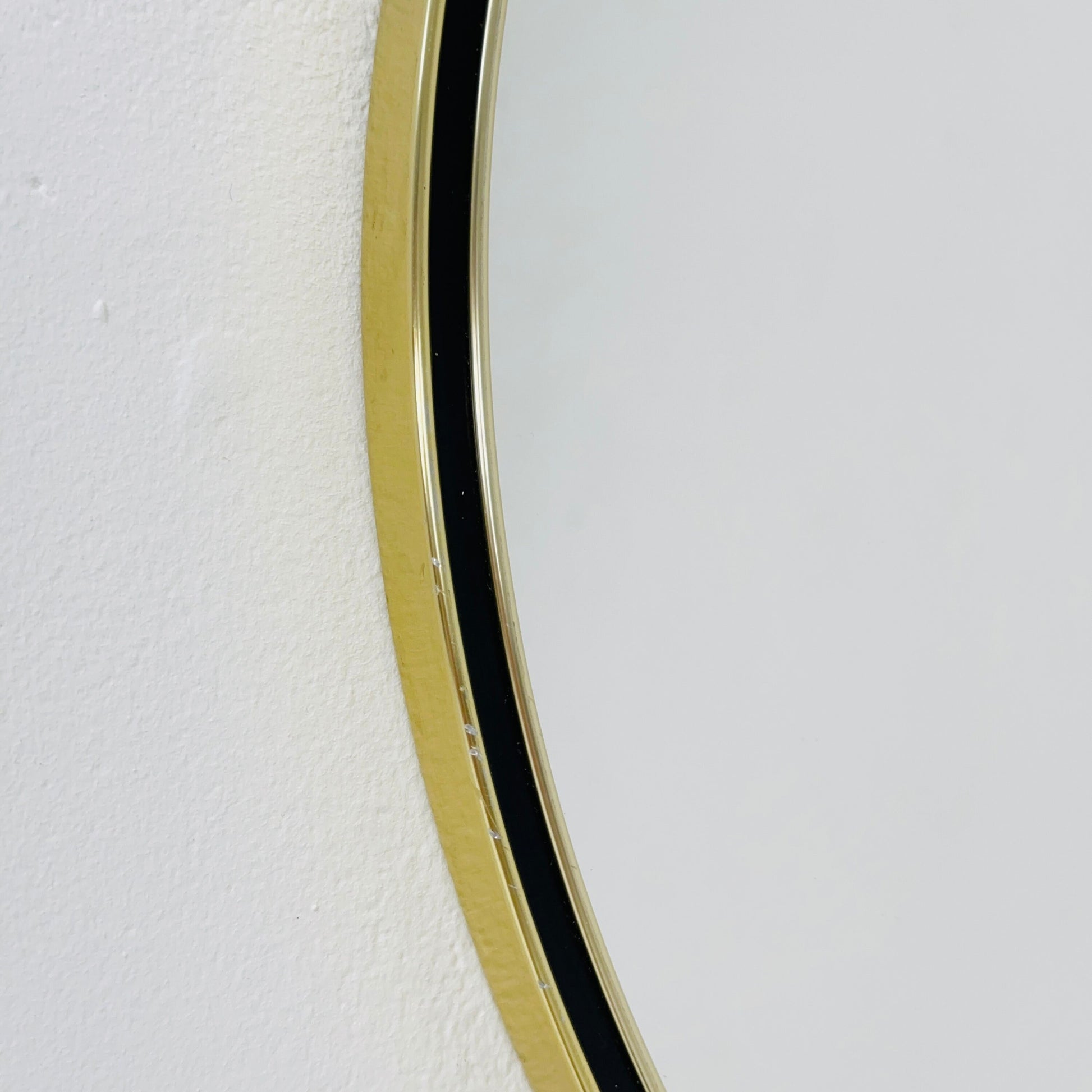 Mid century circle -shaped mirror with golden metal frame- 1960s