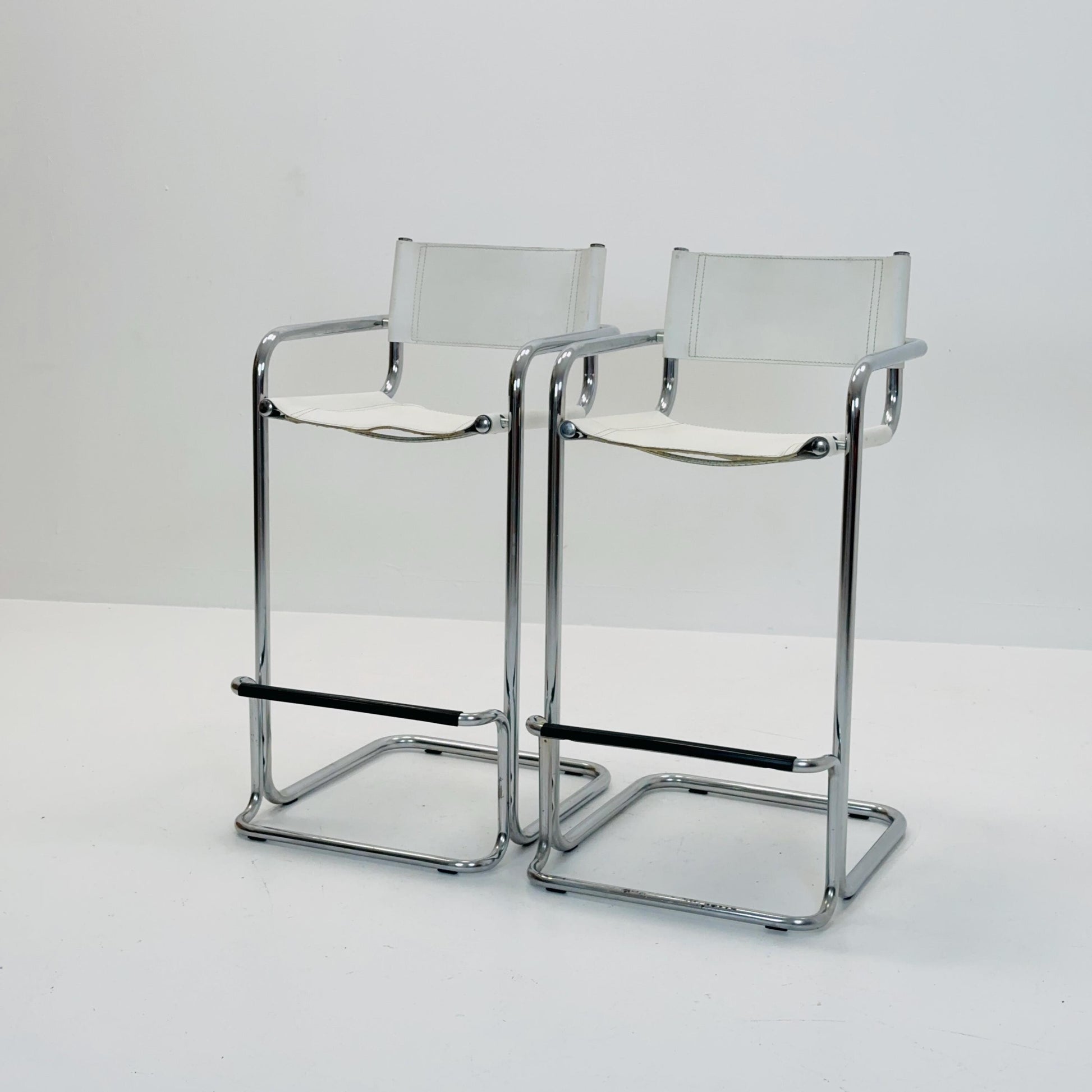 Set of 2 Mart Stam white leather and chrome Italian Mid-Century Modern barstools, 1970s