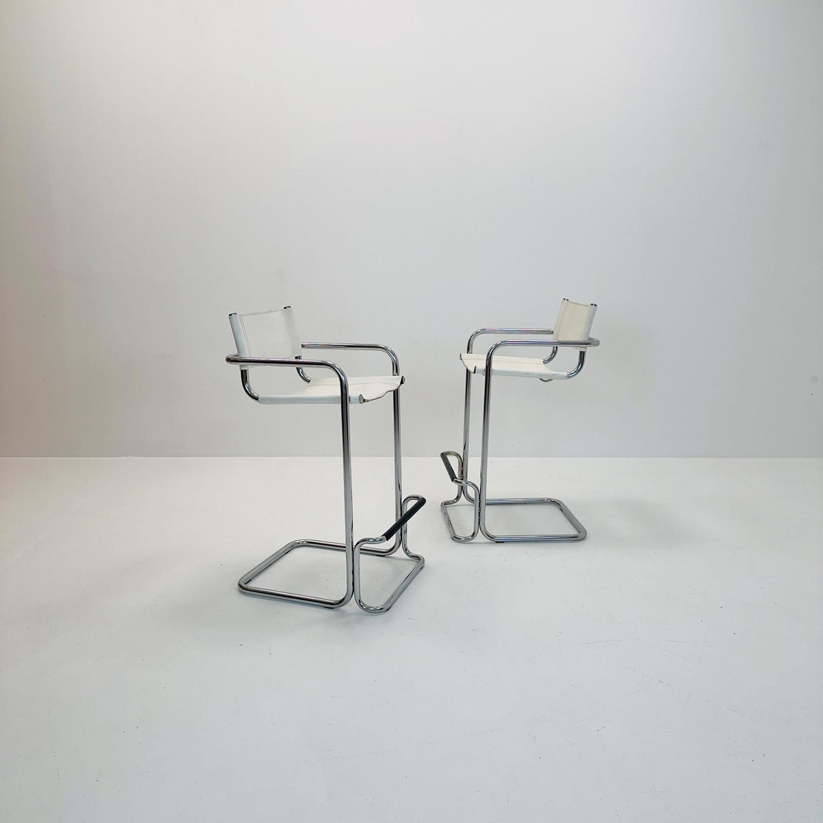 Set of 2 Mart Stam white leather and chrome Italian Mid-Century Modern barstools, 1970s