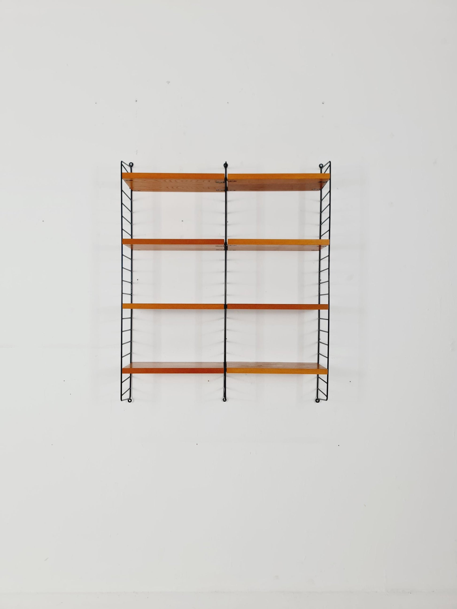 Original MCM Ash shelving system - consists of black lacquered metal ladders, from string Stockholm 1960s