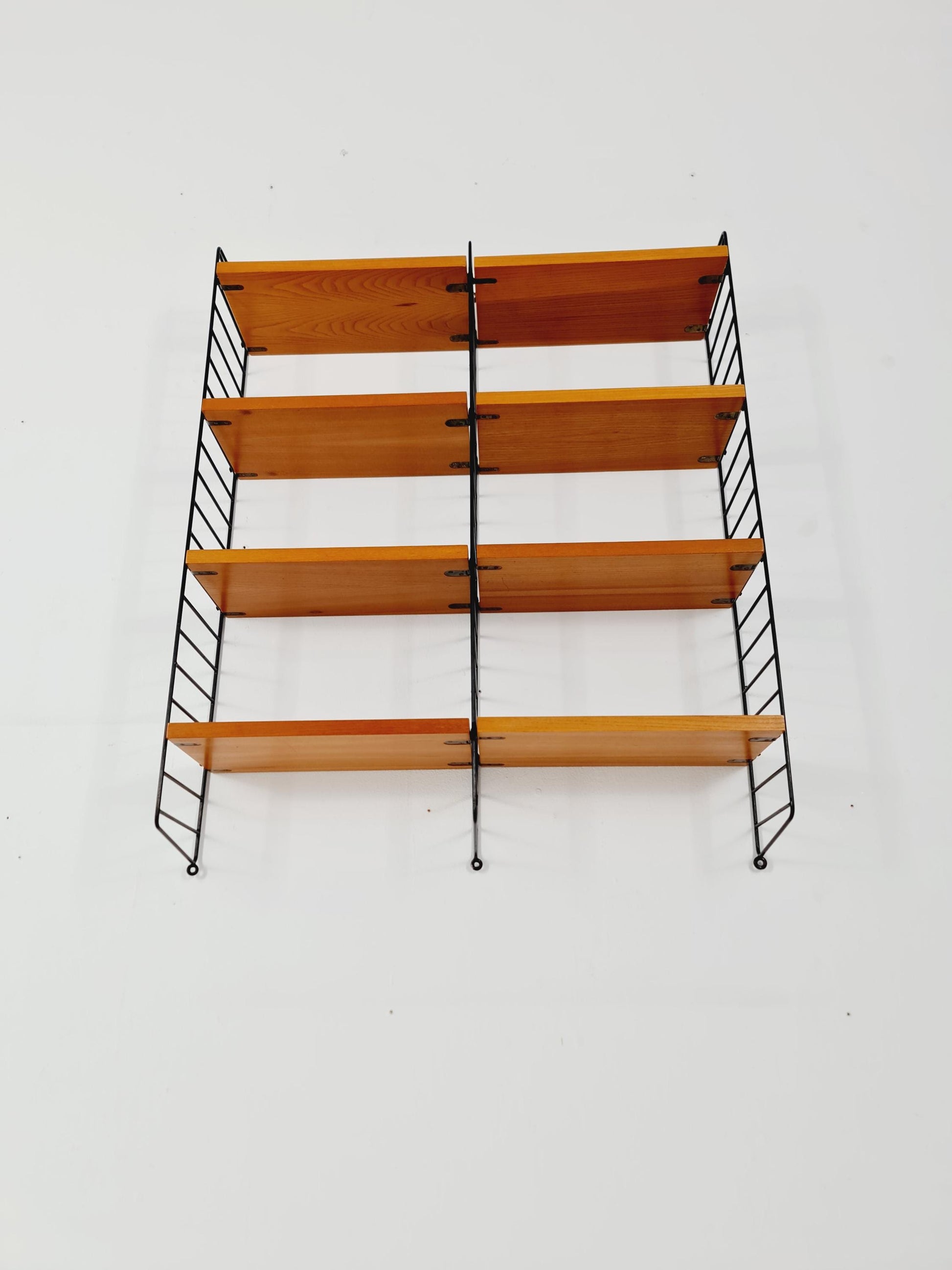 Original MCM Ash shelving system - consists of black lacquered metal ladders, from string Stockholm 1960s