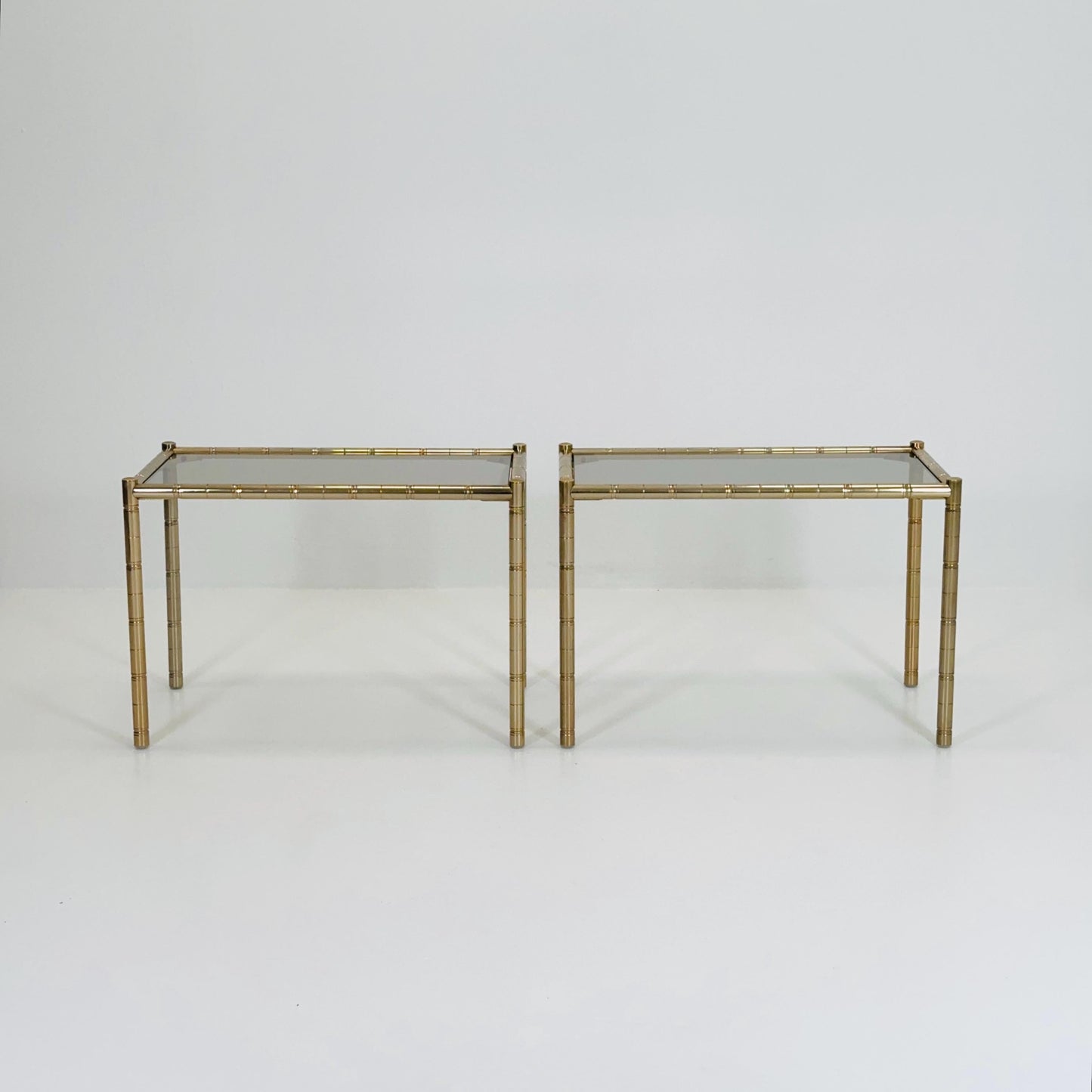 Set of 2 Hollywood regency Brass side tables /bedside tables with artificial bamboo imitation & glass frame, 1960s,Italy