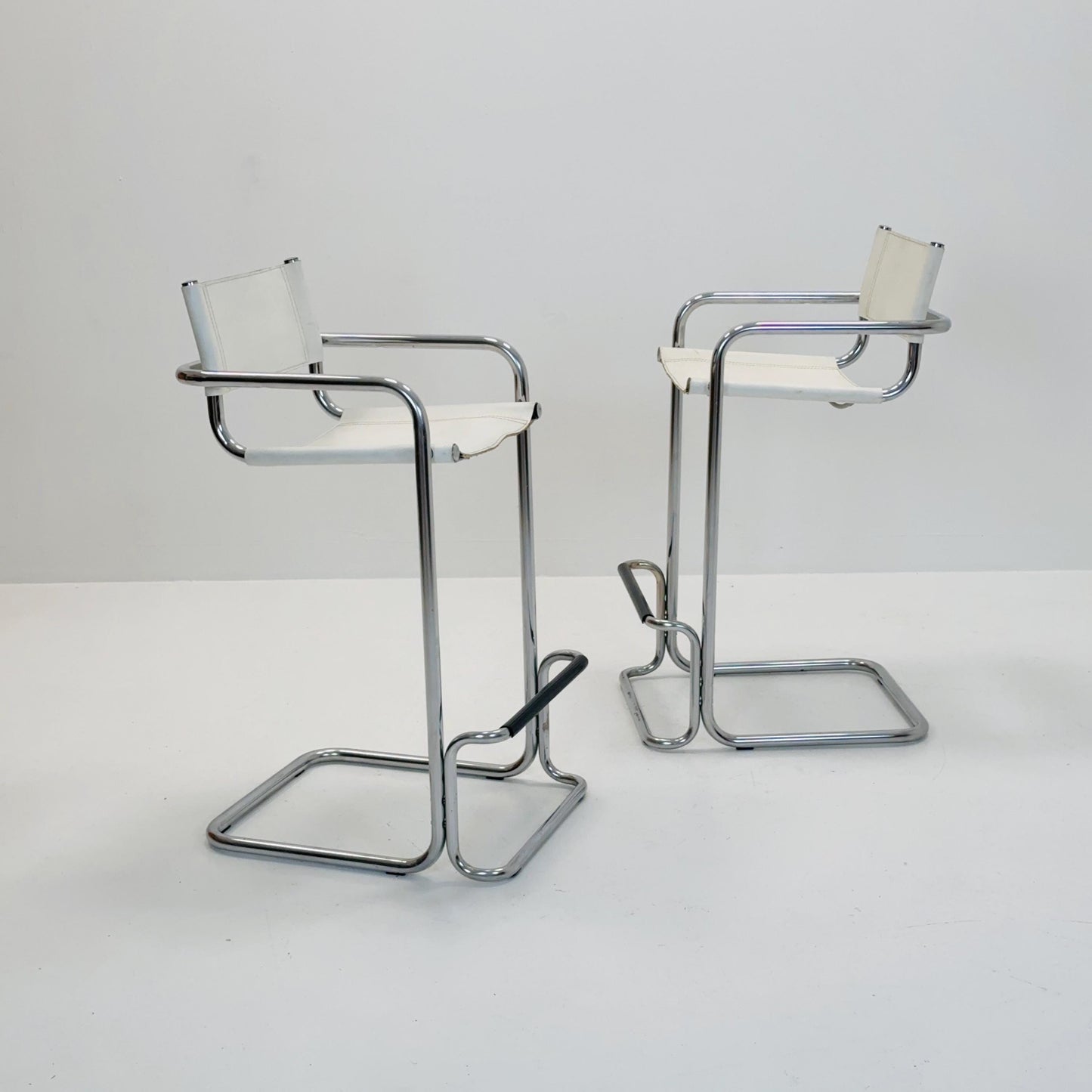 Set of 2 Mart Stam white leather and chrome Italian Mid-Century Modern barstools, 1970s