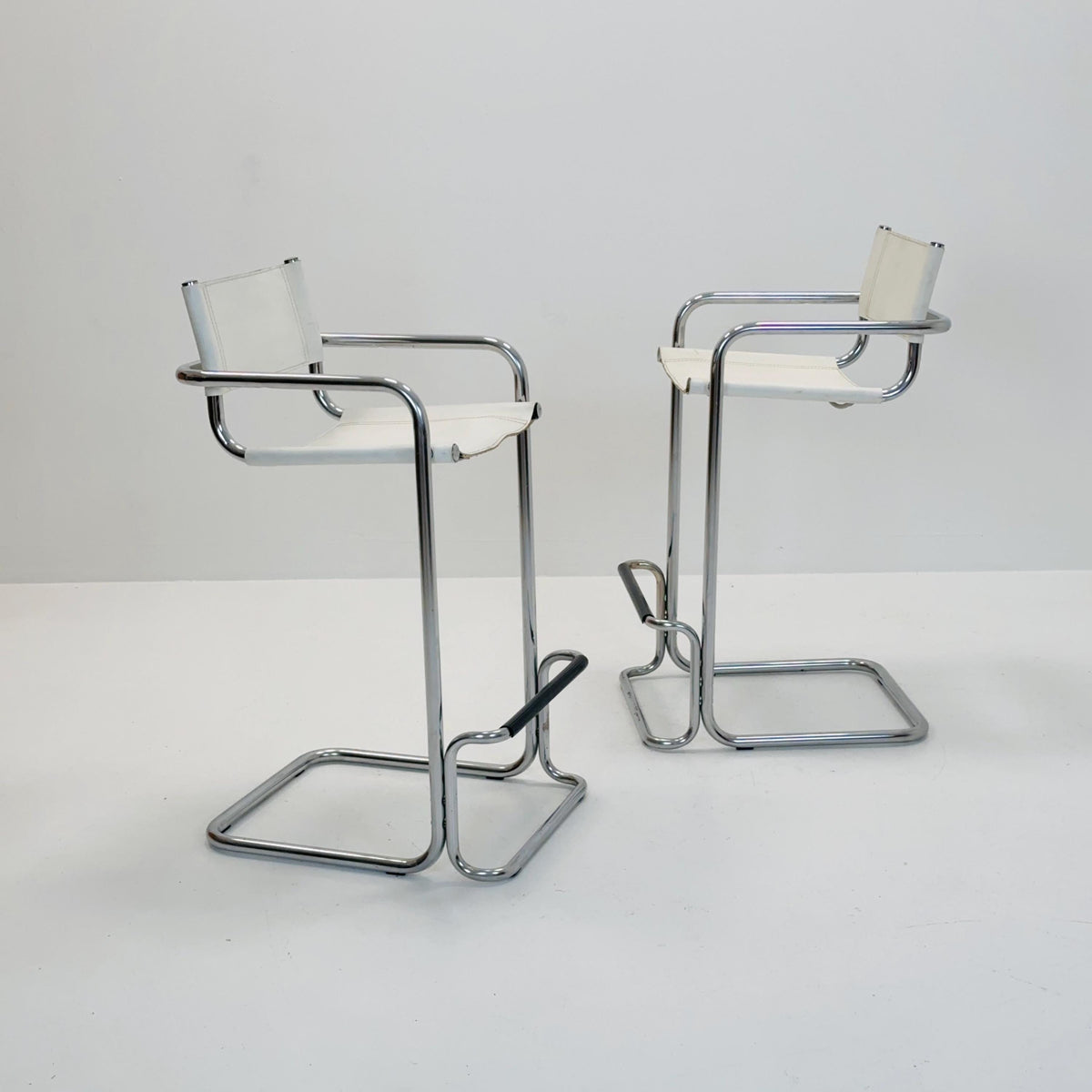 Set of 2 Mart Stam white leather and chrome Italian Mid-Century Modern barstools, 1970s