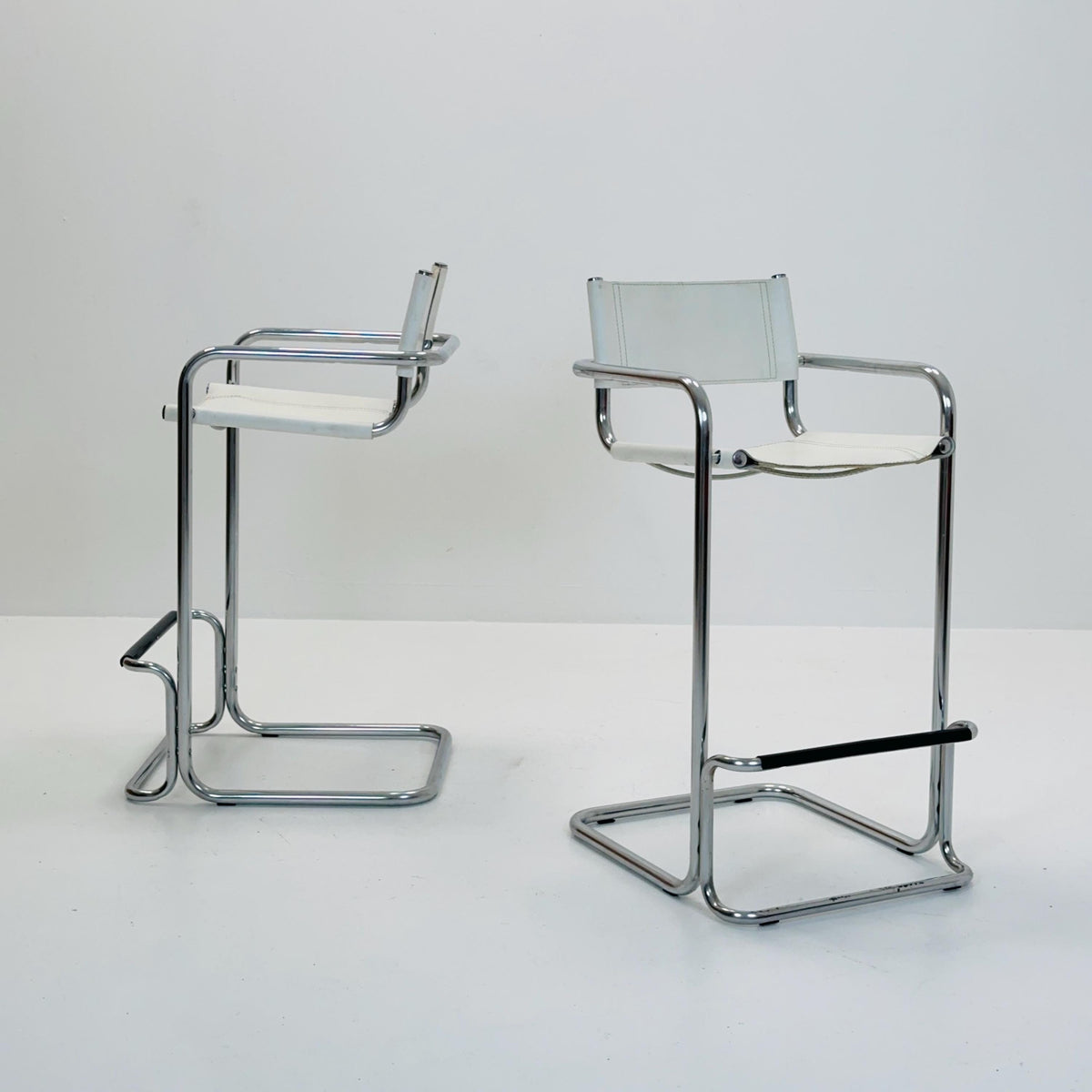Set of 2 Mart Stam white leather and chrome Italian Mid-Century Modern barstools, 1970s