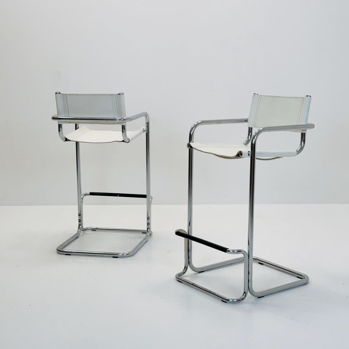 Set of 2 Mart Stam white leather and chrome Italian Mid-Century Modern barstools, 1970s