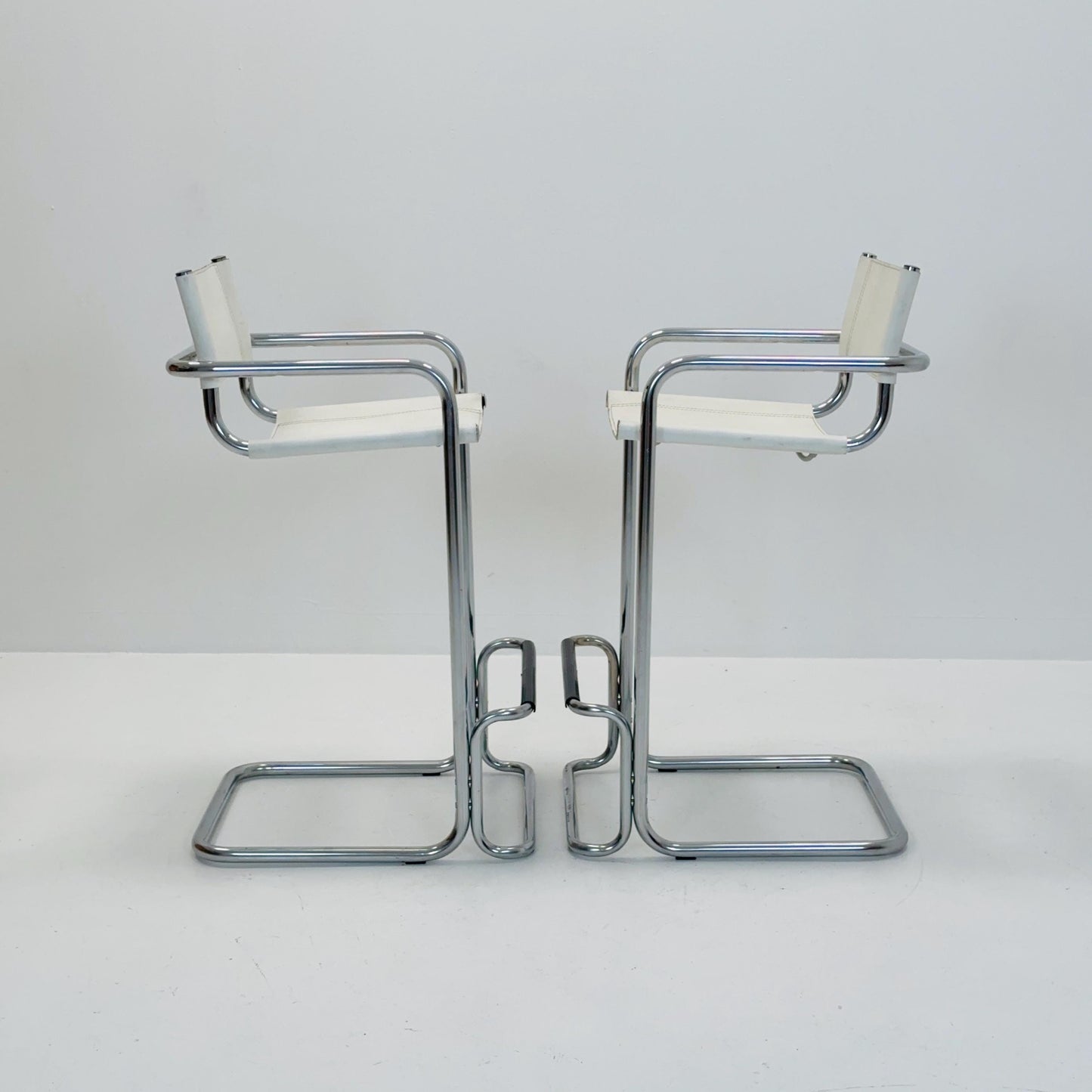 Set of 2 Mart Stam white leather and chrome Italian Mid-Century Modern barstools, 1970s