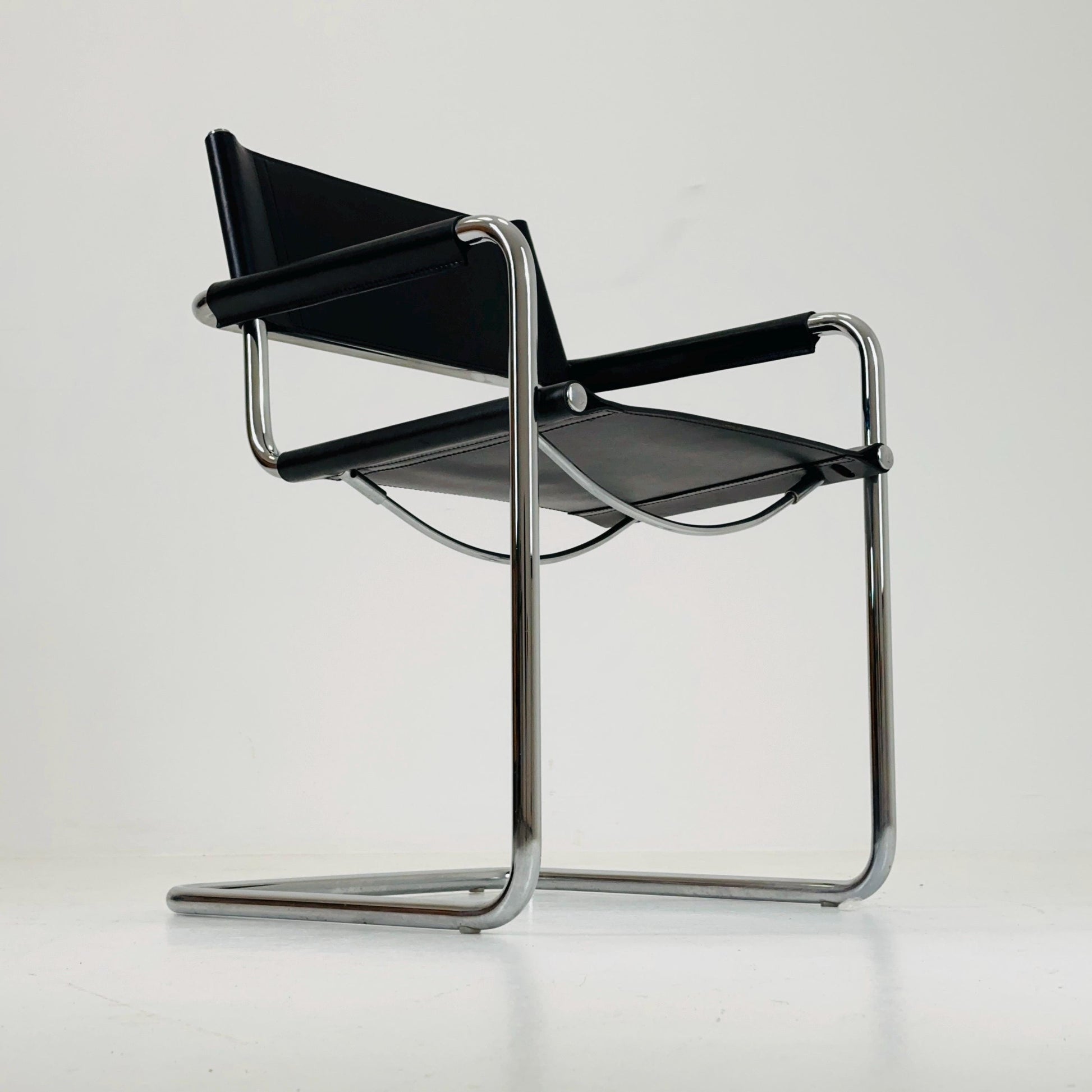 1 of 2 vintage B34 dark black color leather cantilevered chairs by Mart Stam for Jox Interni Italy 1980s