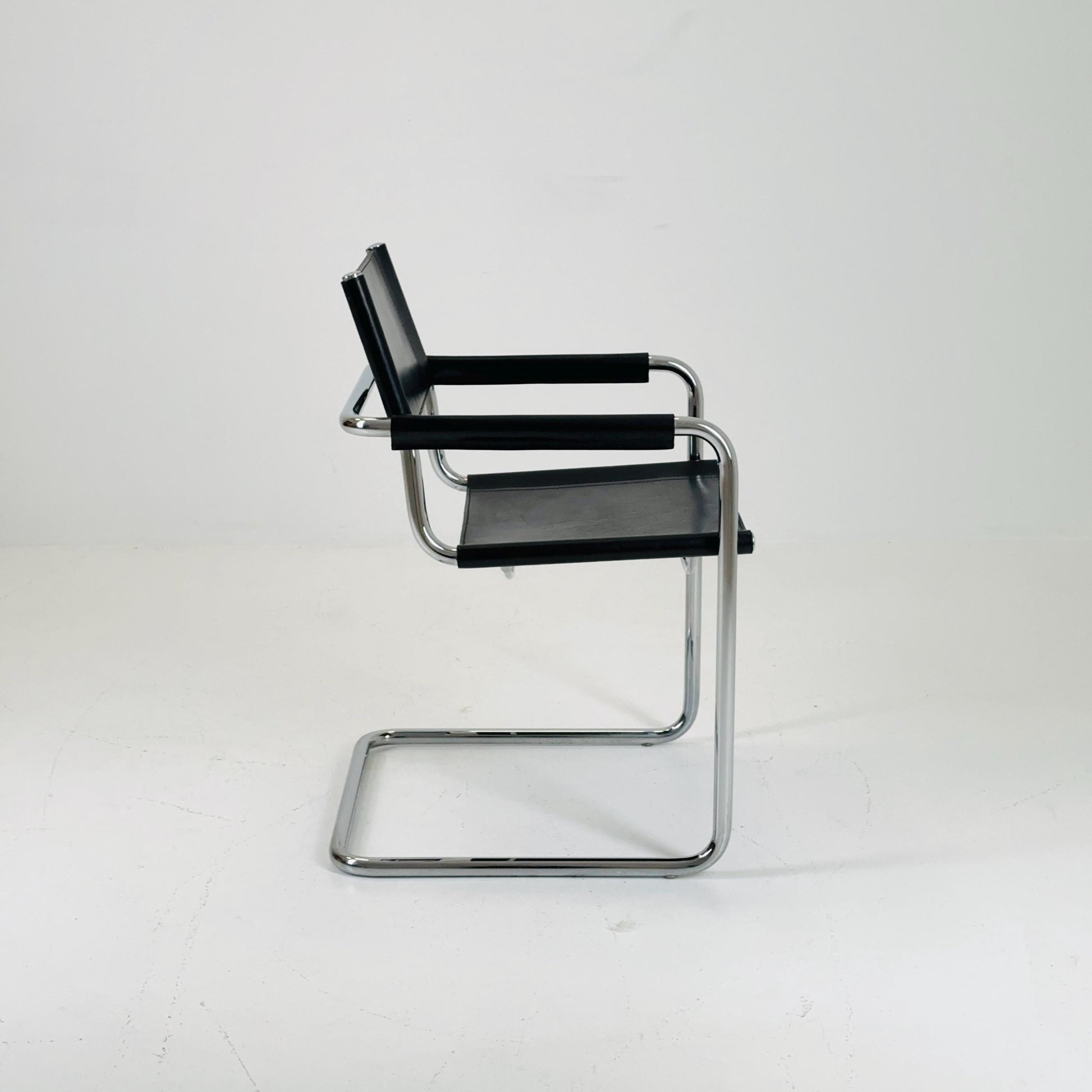 1 of 2 vintage B34 dark black color leather cantilevered chairs by Mart Stam for Jox Interni Italy 1980s