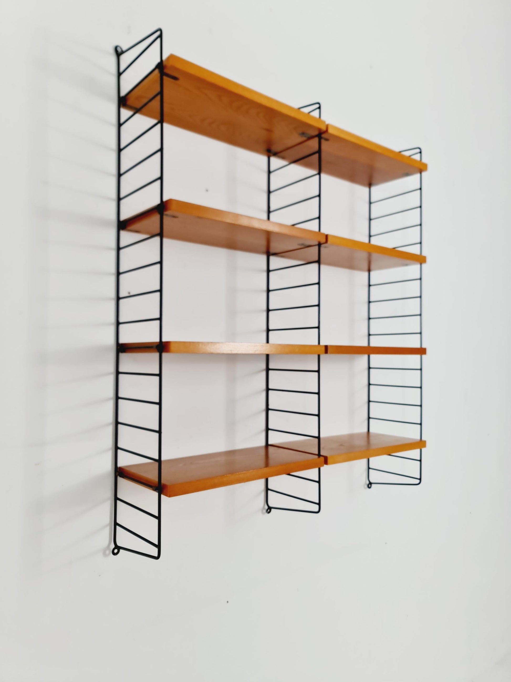 Original MCM Ash shelving system - consists of black lacquered metal ladders, from string Stockholm 1960s