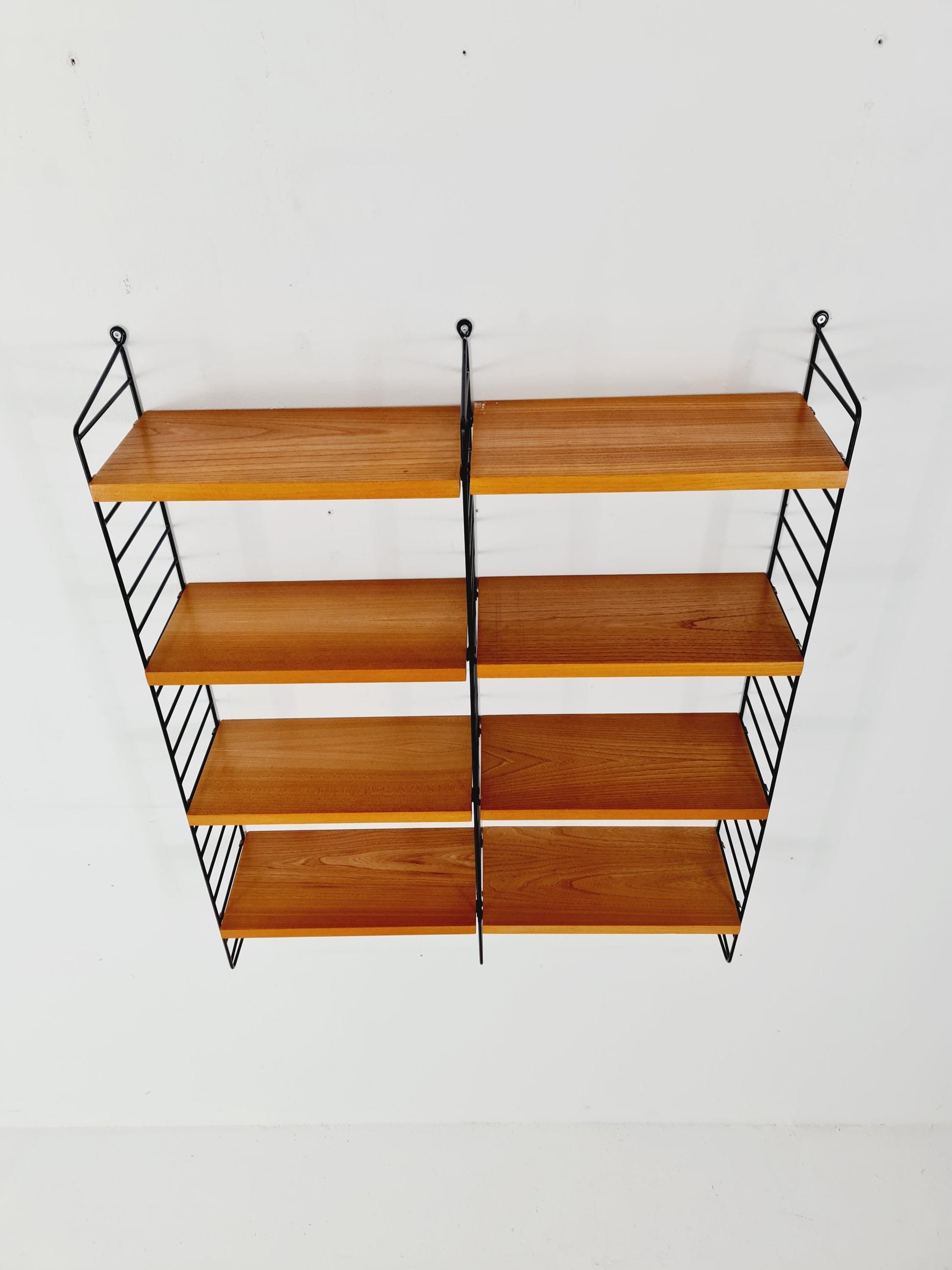 Original MCM Ash shelving system - consists of black lacquered metal ladders, from string Stockholm 1960s