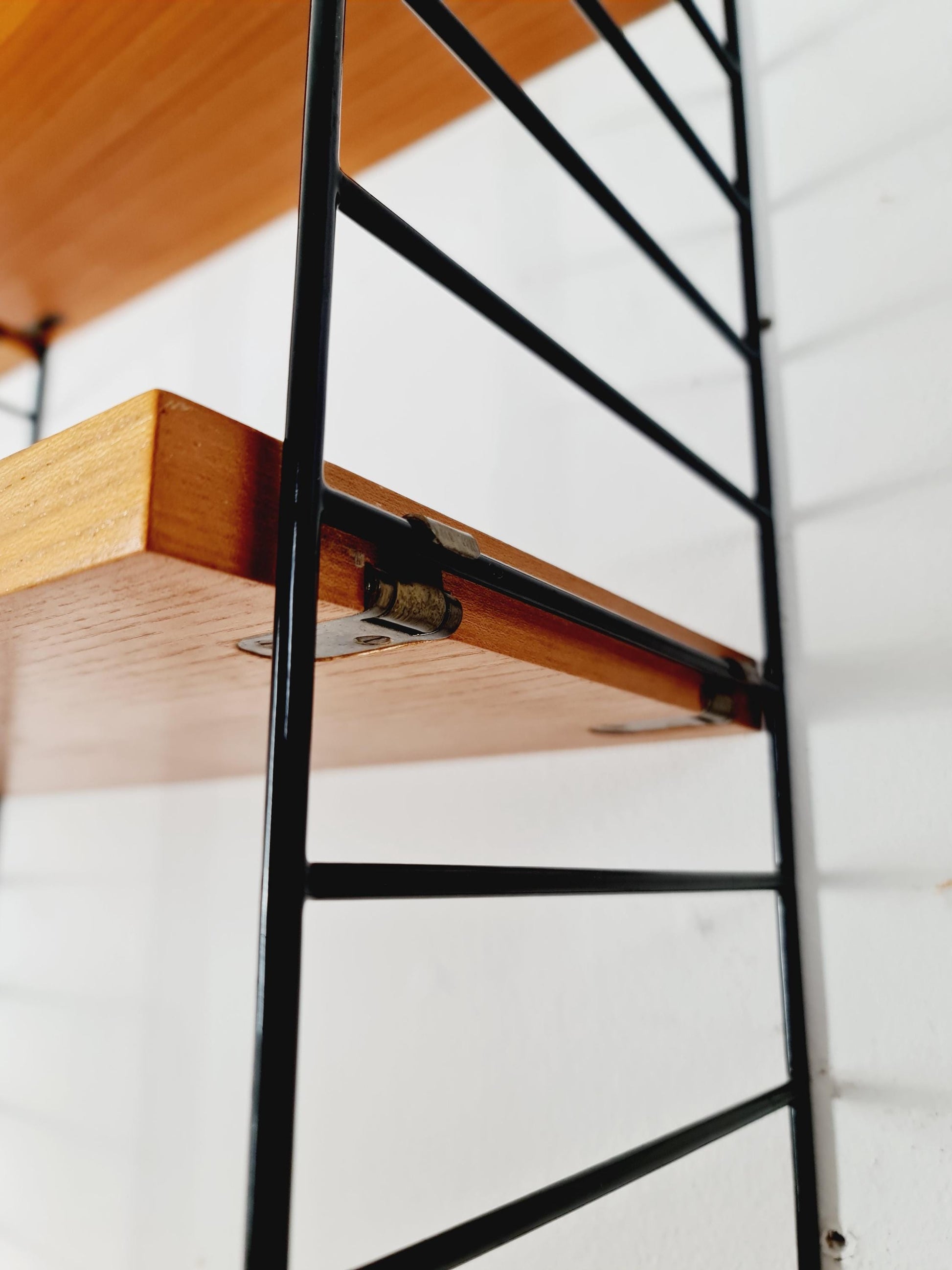 Original MCM Ash shelving system - consists of black lacquered metal ladders, from string Stockholm 1960s