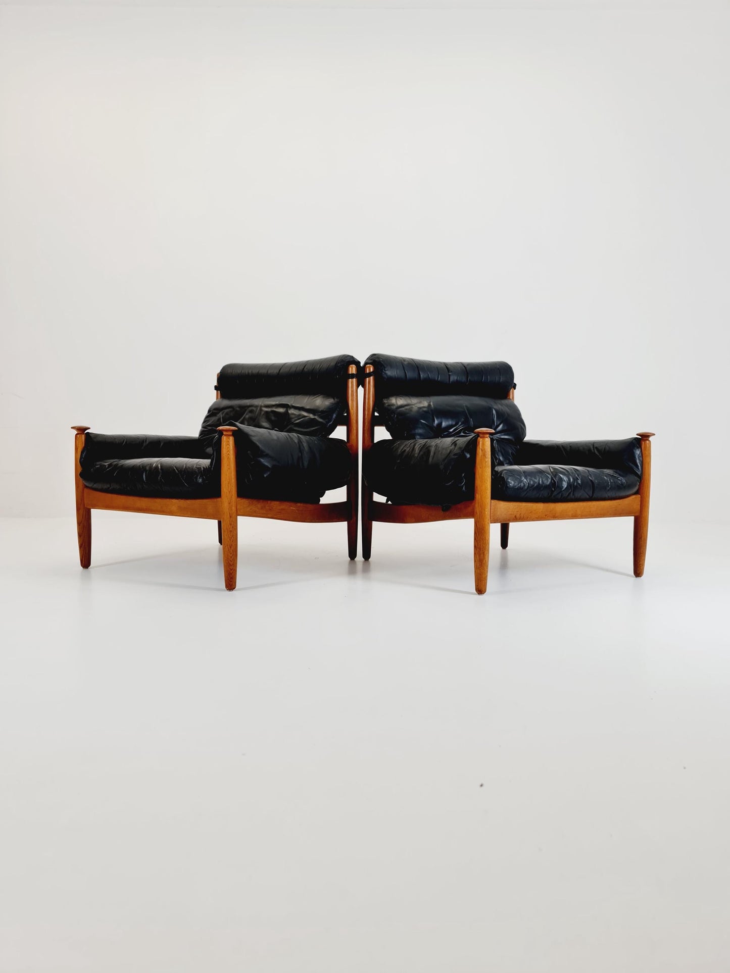 mid century armchairs By Eric Merthen for ire möbler in leather and Oak wood , Sweden 1960s