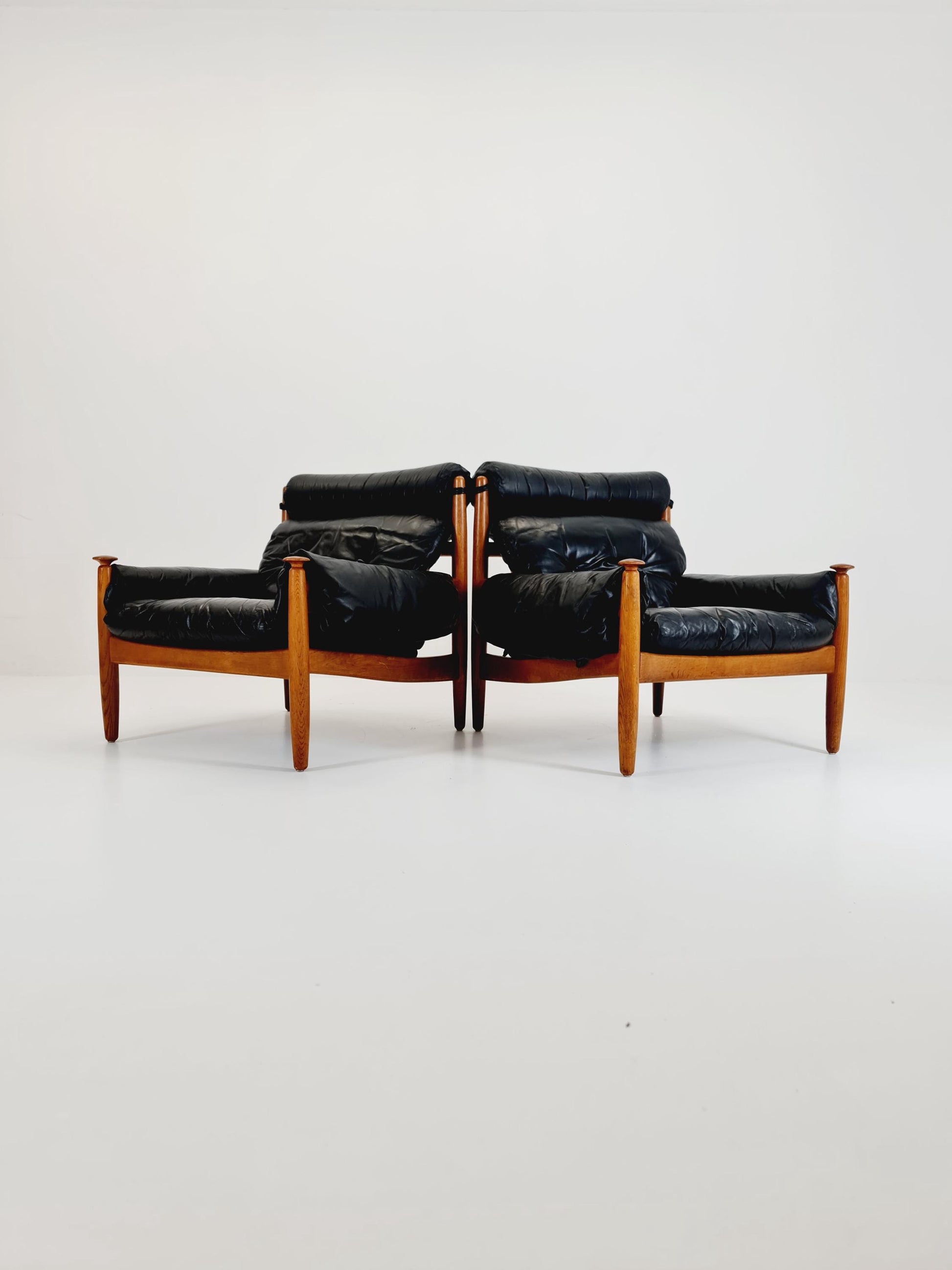 mid century armchairs By Eric Merthen for ire möbler in leather and Oak wood , Sweden 1960s