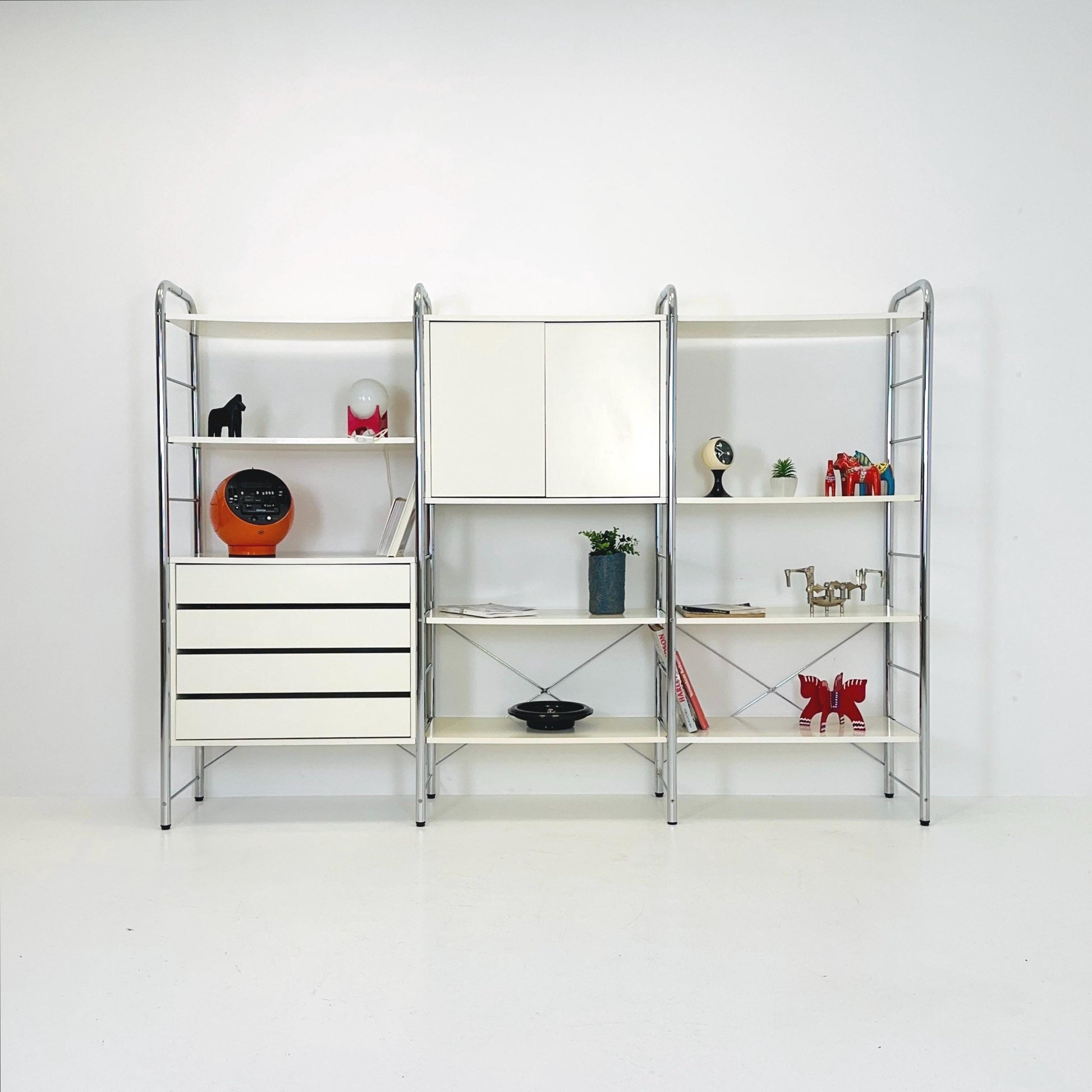 Minimalist white standing modular shelving system “Niklas” by Rutger Andersson for IKEA Sweden 1980s