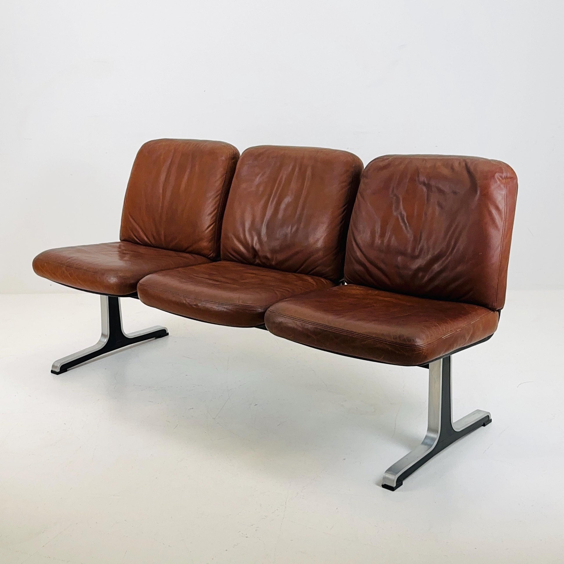 Mid century Bauhaus waiting bench- Sofa in brown leather . Italy 1980s