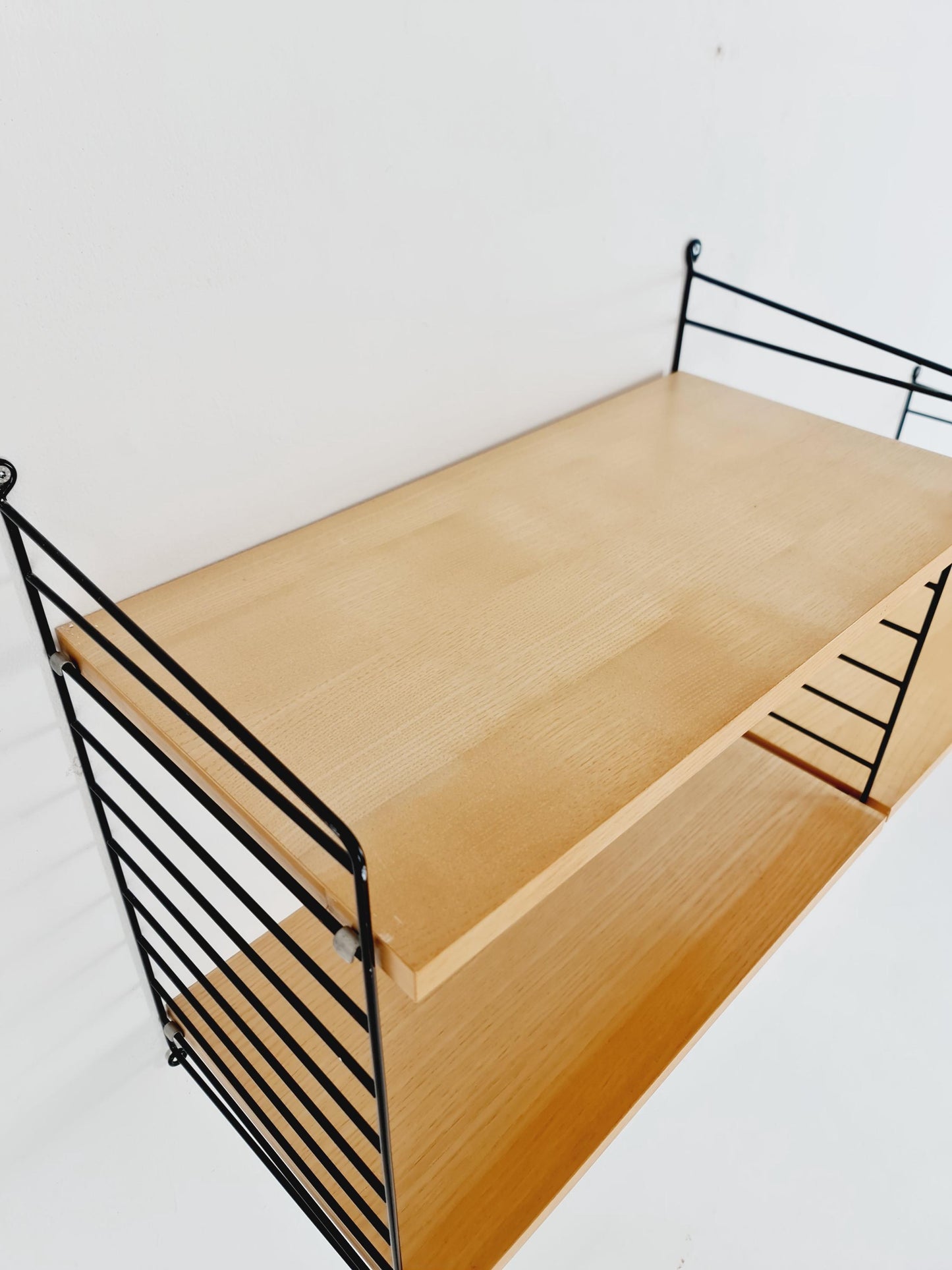 Original MCM Ash shelving system - consists of Black lacquered metal ladders, from string Stockholm 1960s