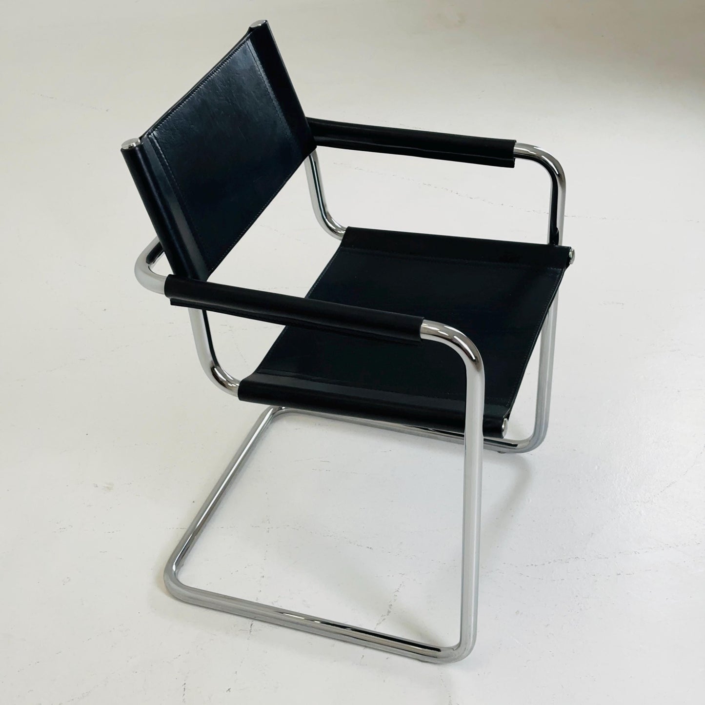 1 of 2 vintage B34 dark black color leather cantilevered chairs by Mart Stam for Jox Interni Italy 1980s