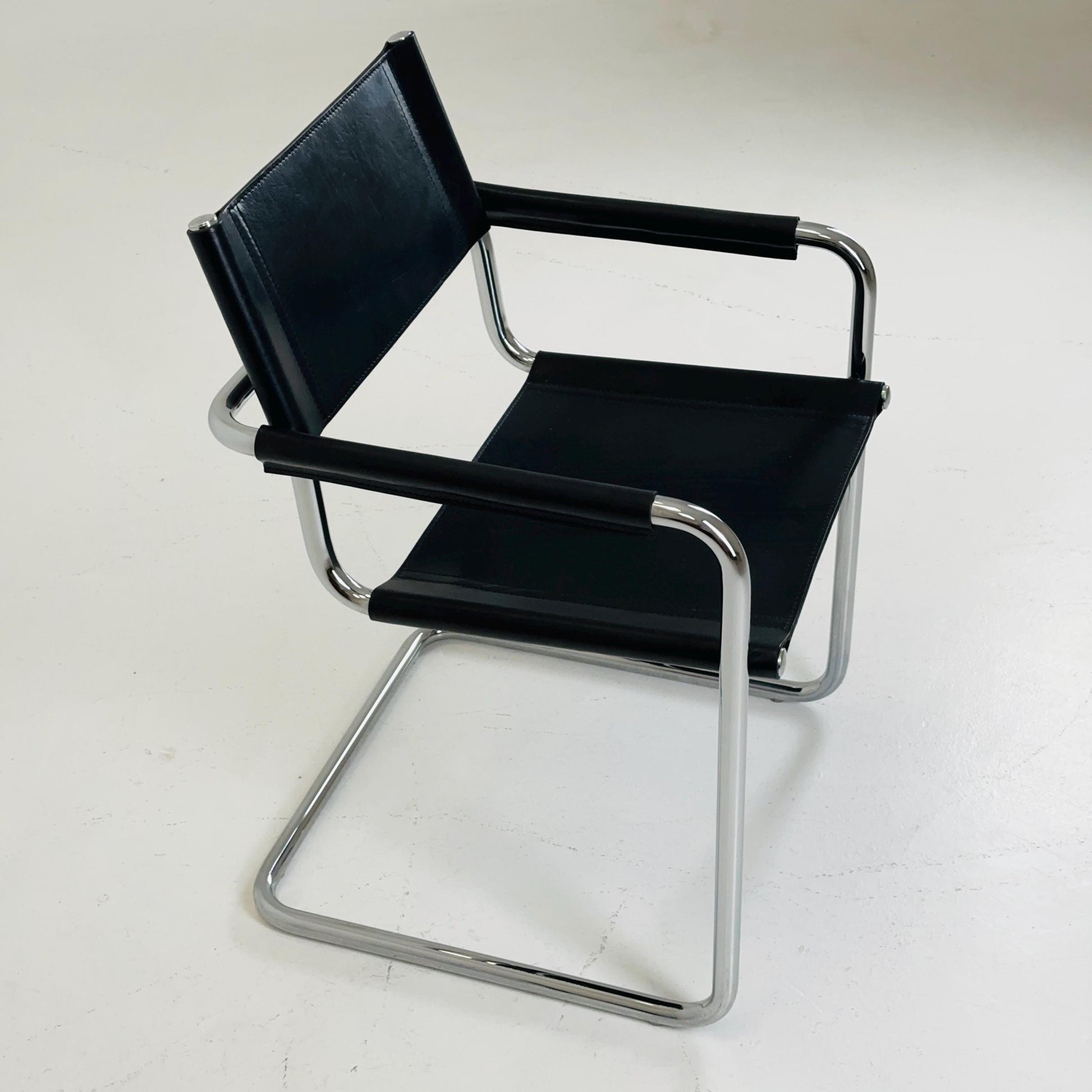 1 of 2 vintage B34 dark black color leather cantilevered chairs by Mart Stam for Jox Interni Italy 1980s