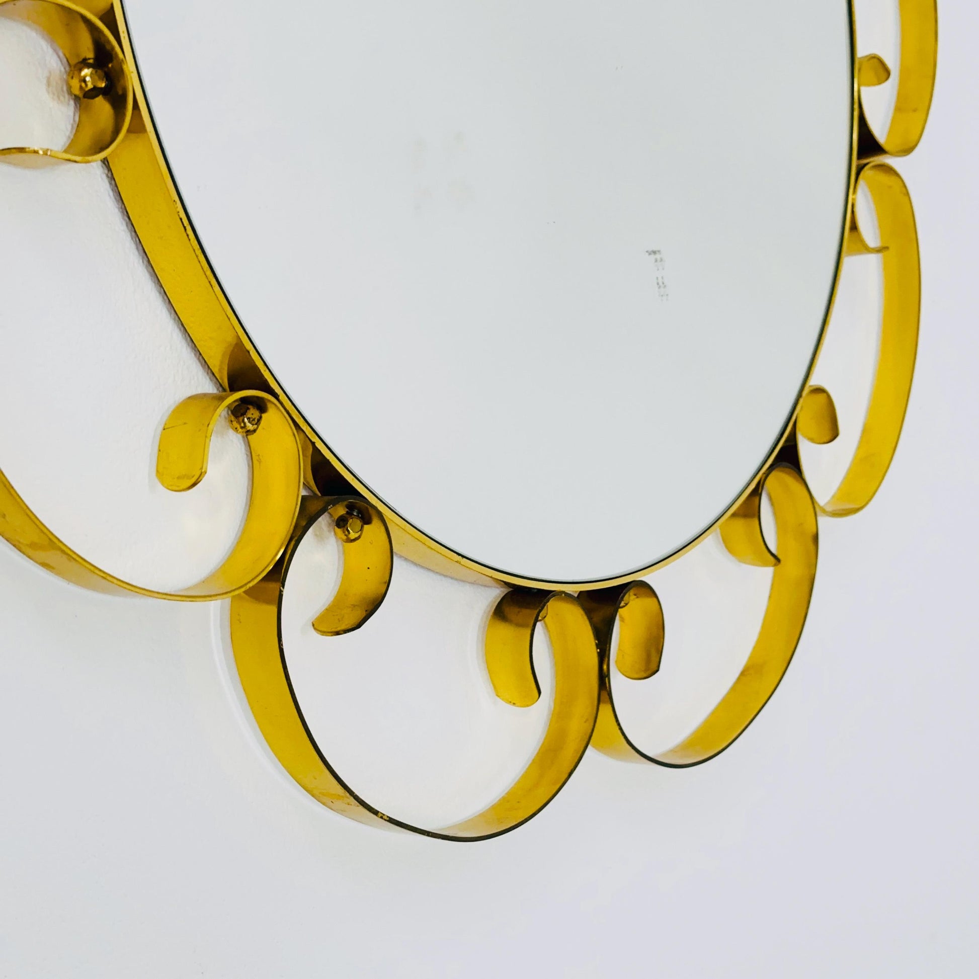 Mid century circle -shaped mirror with golden metal frame- 1960s Italy
