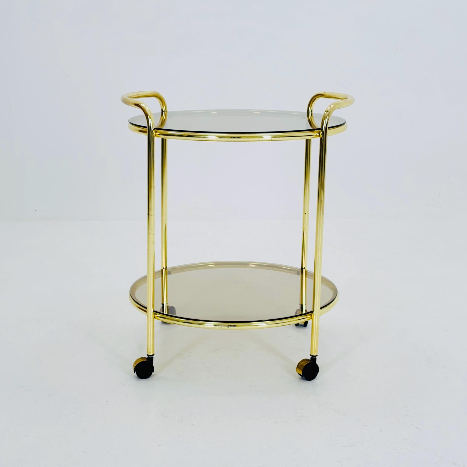 Mid Century Modern Bar/ Tea Cart Gold/Brass smoked Glass France 1970s .