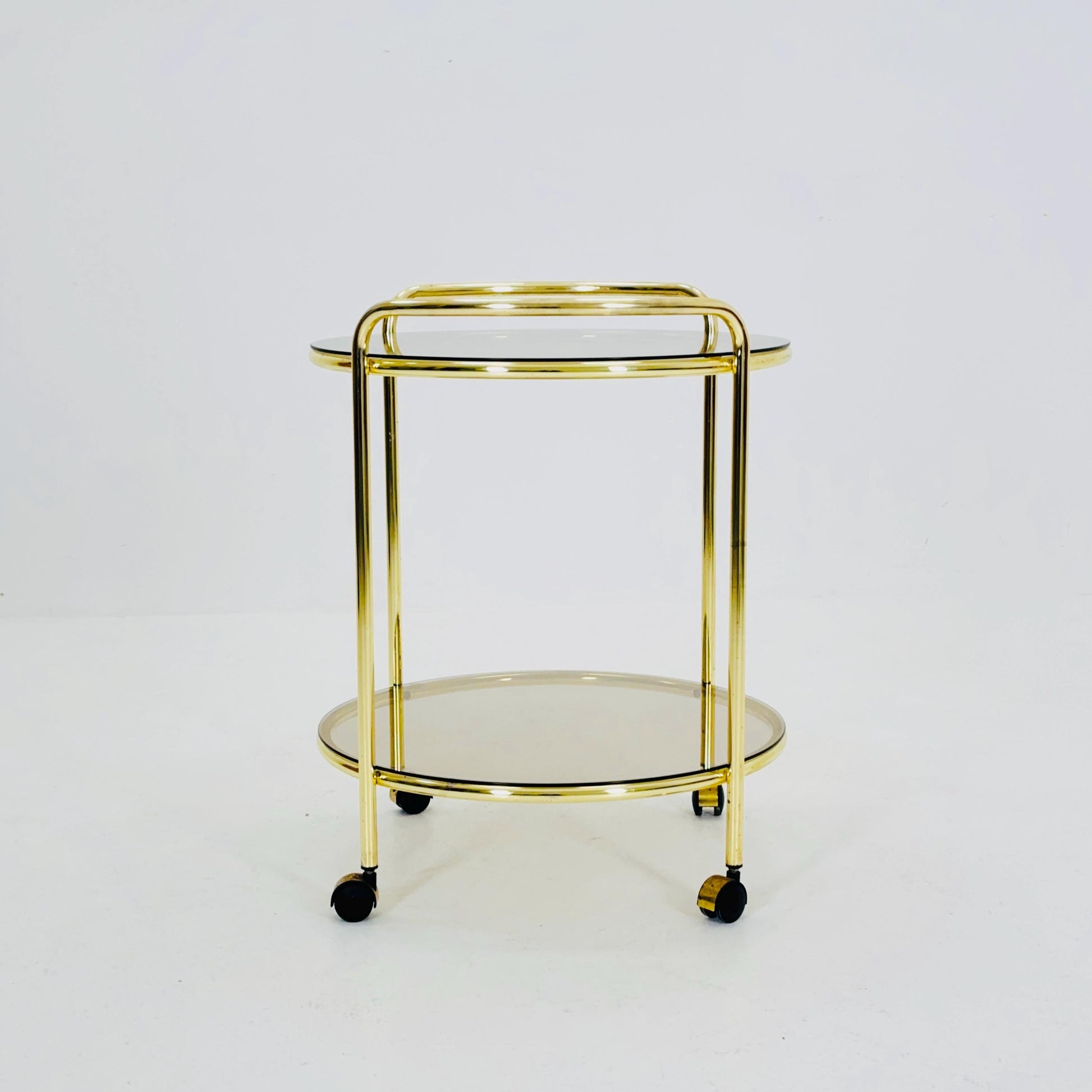 Mid Century Modern Bar/ Tea Cart Gold/Brass smoked Glass France 1970s .