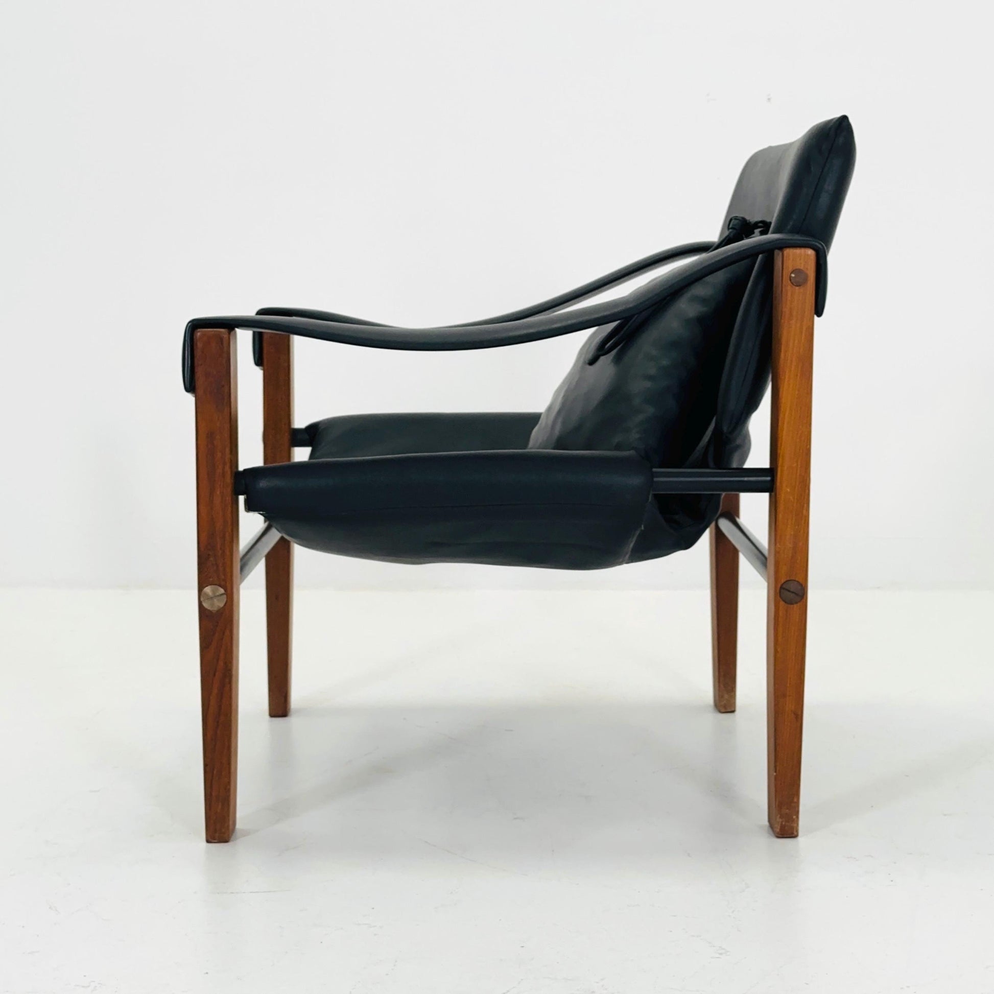 Mid century black leather Safari armchairs from Arkana by Maurice Burke, United Kingdom 1970s Scotland