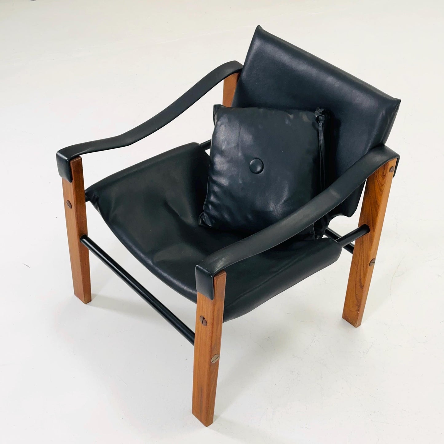 Mid century black leather Safari armchairs from Arkana by Maurice Burke, United Kingdom 1970s Scotland