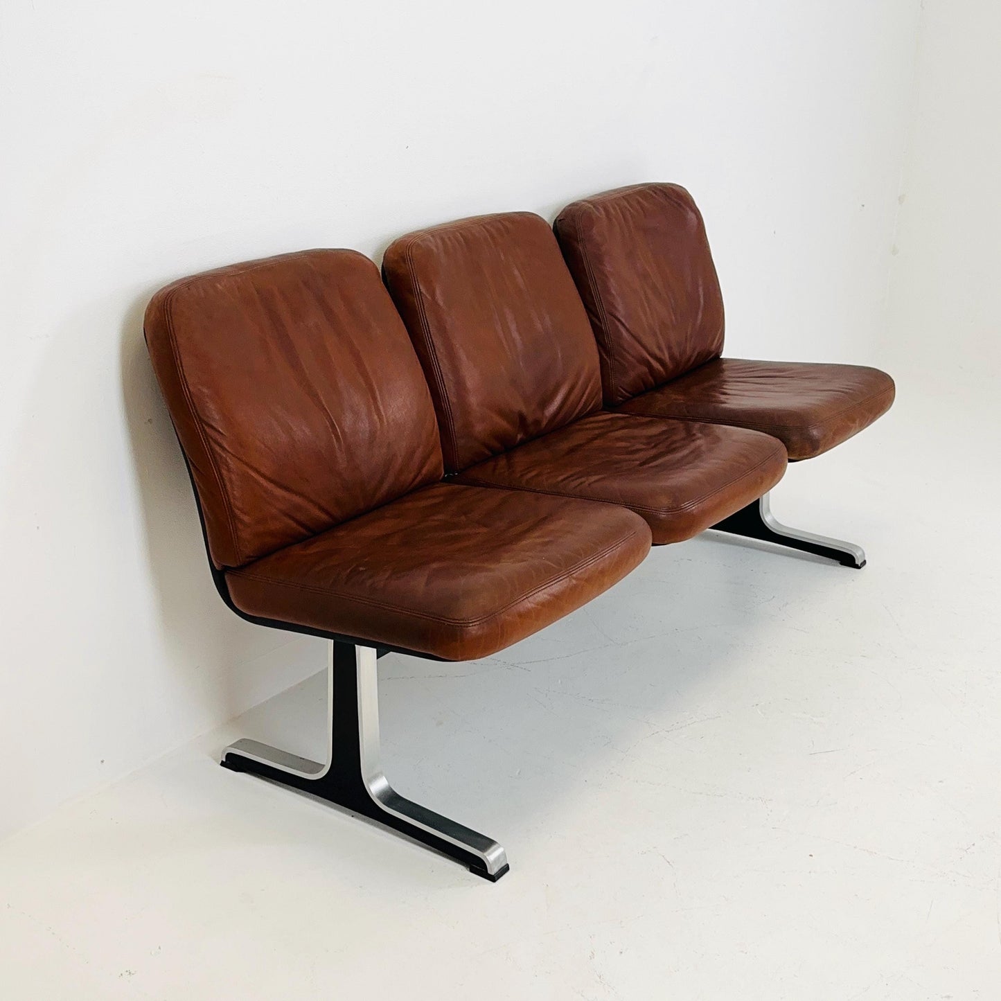 Mid century Bauhaus waiting bench- Sofa in brown leather . Italy 1980s