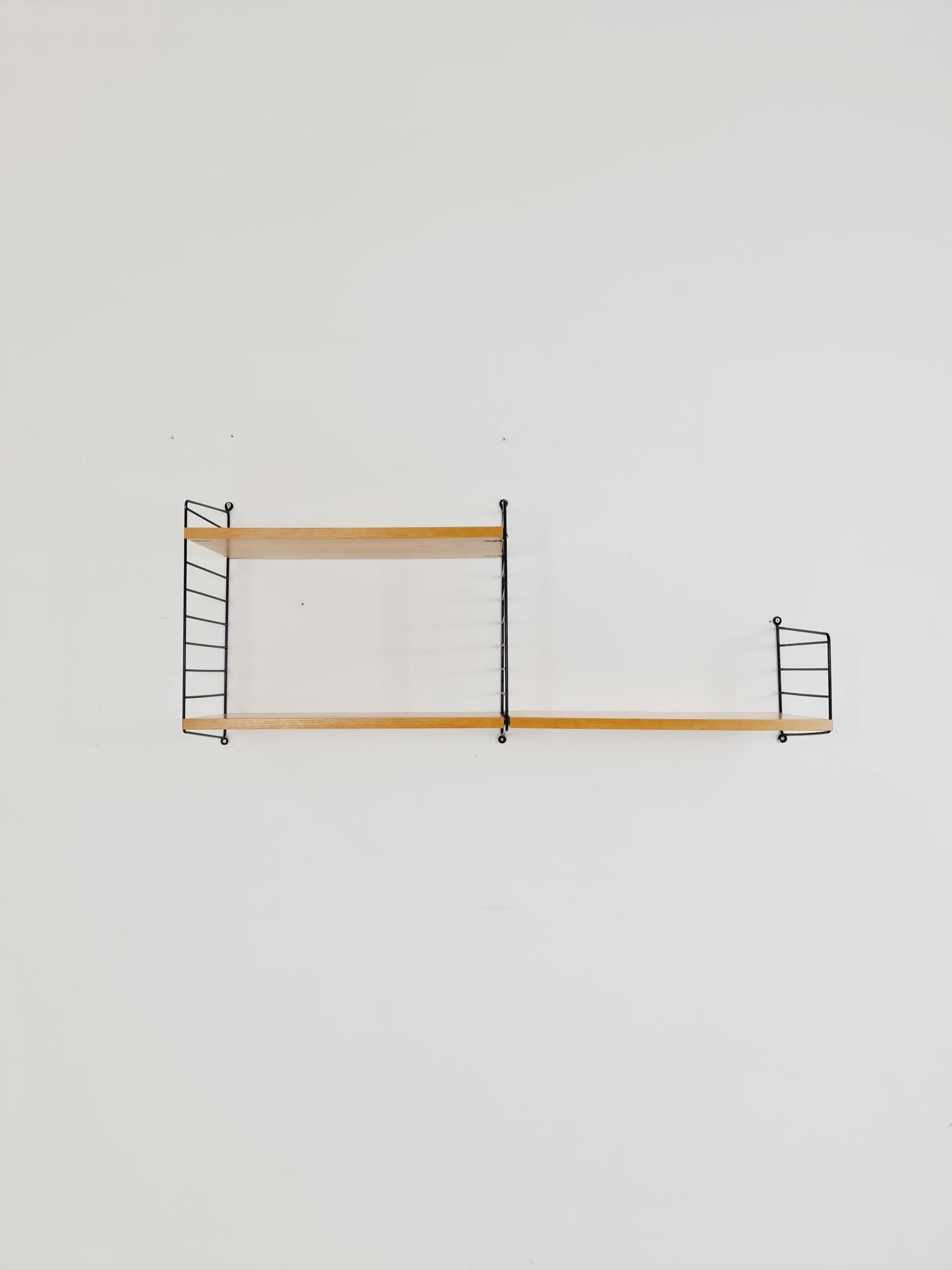 Original MCM Ash shelving system - consists of Black lacquered metal ladders, from string Stockholm 1960s