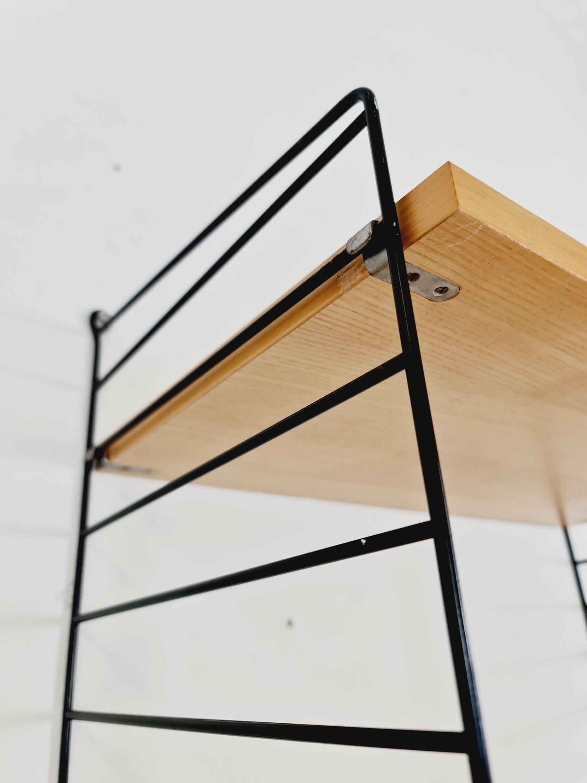 Original MCM Ash shelving system - consists of Black lacquered metal ladders, from string Stockholm 1960s