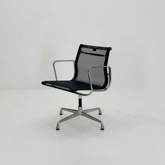 Mid century Eames EA 108 office chair by Vitra with black mesh and polished aluminum 1960s